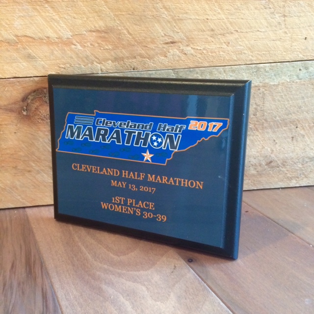 The 2017 plaques. 1st, 2nd, and 3rd place in 5 year age groups in the half marathon and 5k will earn a custom age group award plaque!