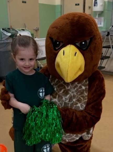Happy #nationalmascotday to our Holy Cross Hawk! 💚 #adwcommunity #iloveholycross #gohawks🦅
