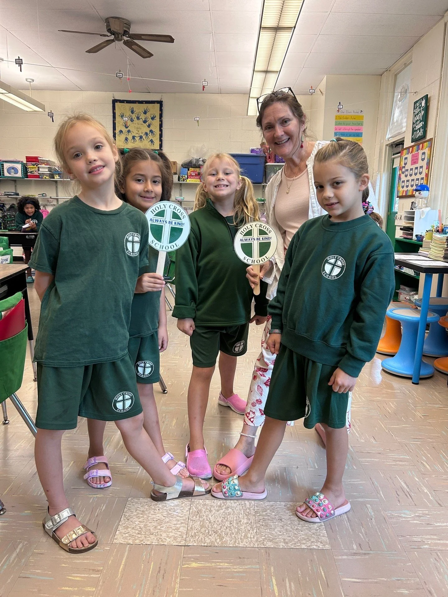 Faculty, staff, and students celebrated Flip Flop Friday (plus Crocs and slides!) as a fun way to say goodbye to summer and step into a great new school year! #ADWcommUNITY #ILoveHolyCross #HCSspirit #FlipFlopFriday #BackToSchoolFun