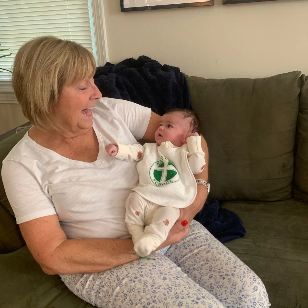 Mrs. Smith’s great-niece (and Mrs. Falcone’s sweet grandbaby!) is already rocking her Holy Cross School spirit wear in style! 💚 #HCSspirit #FamilyTradition #FutureHawk #ADWcommUNITY #ILoveHolyCross