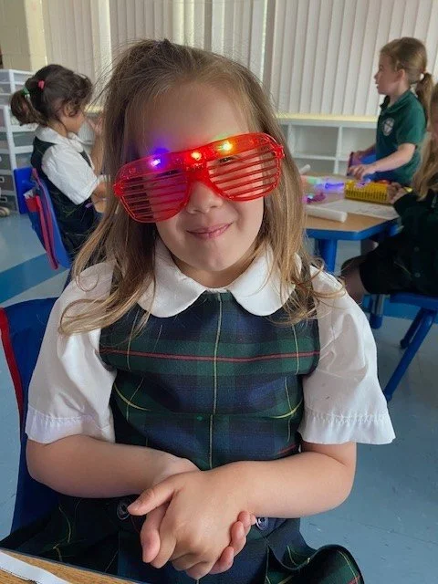Our Kindergarteners were glowing with excitement as they celebrated summer birthdays with a Glow Party! From glow sticks and special treats to lots of smiles and laughter, it was the perfect way to celebrate friends before the school year comes to a 
