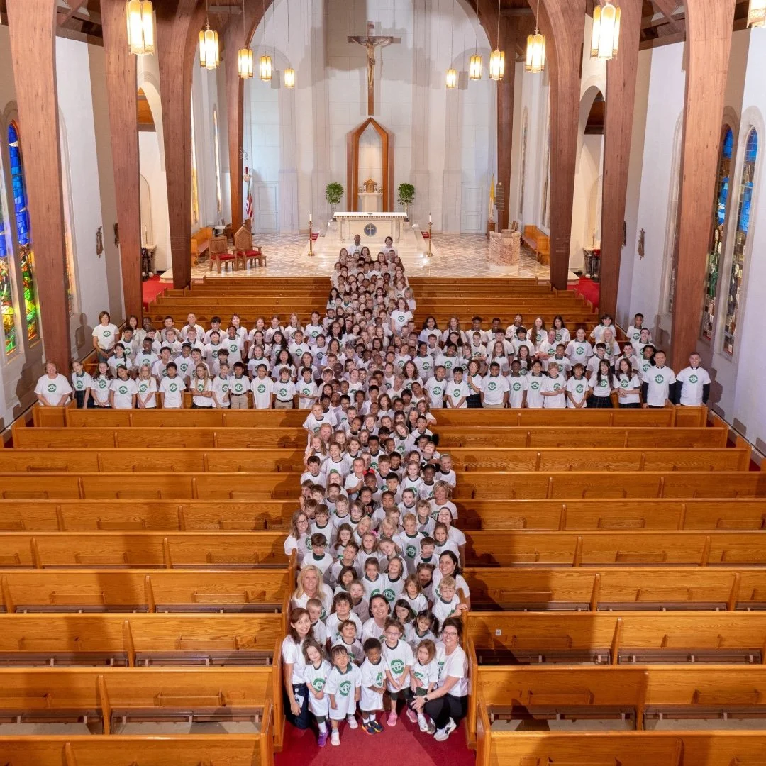 What a beautiful way to celebrate the Feast of the Exaltation of the Holy Cross and 65 years of Holy Cross School! Our entire school community gathered in church for this special photo. Together, we are one community, one family, and one body in Chri