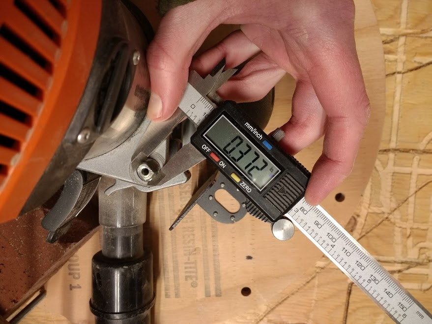 Use a precise measuring device to measure the width of the fine adjustment shaft. The coupler you choose when purchasing your Z-Axis Kit will connect the fine adjustment shaft on your router to the Z-Axis motor. Be sure to remove the knob that is (usually) attached to this shaft before measuring it.