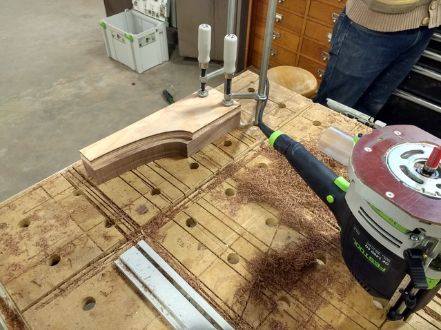Template clamped to rough cut walnut stock, ready to be routed