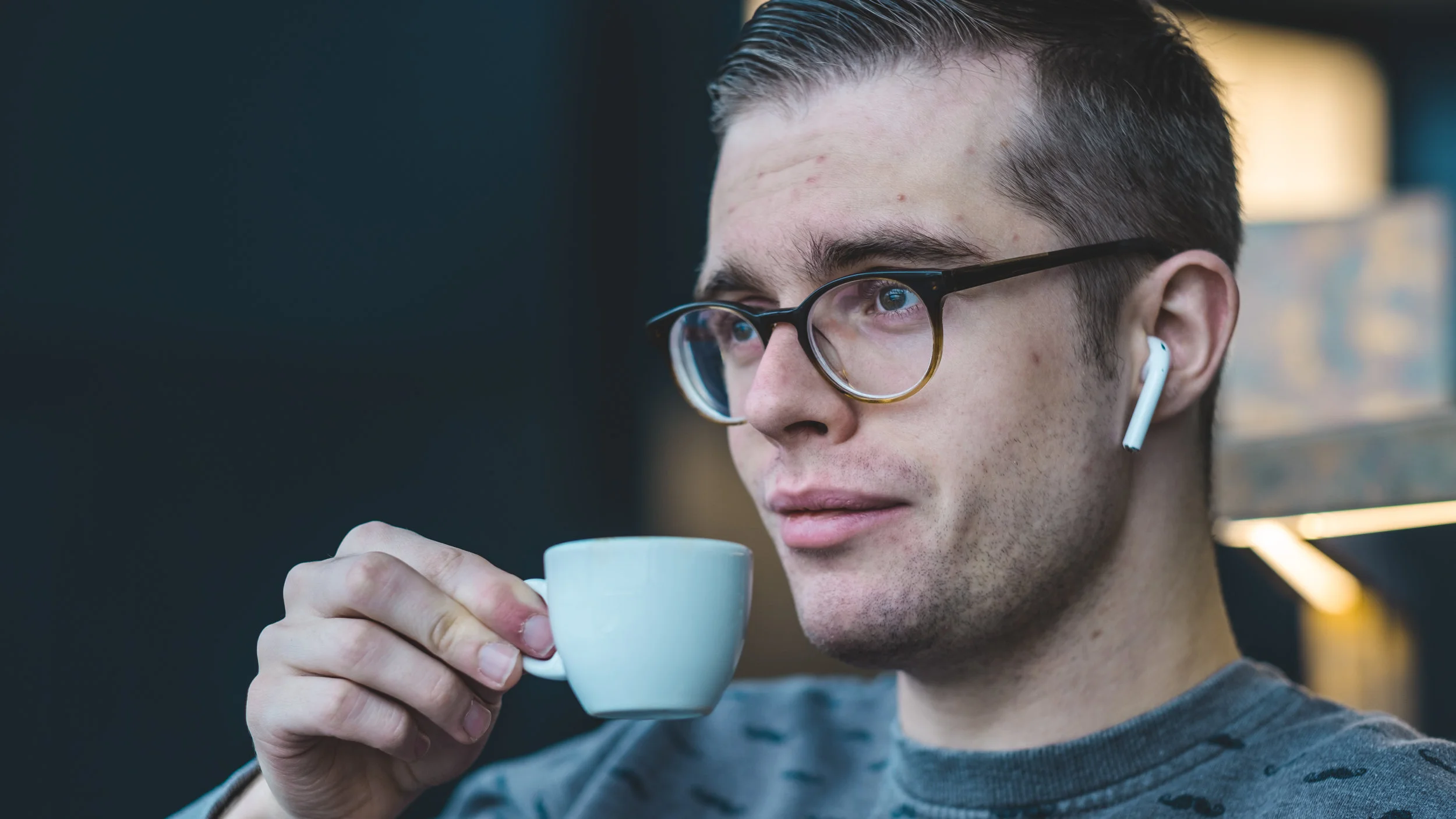 Work includes drinking coffee in airports. Photo by Vince