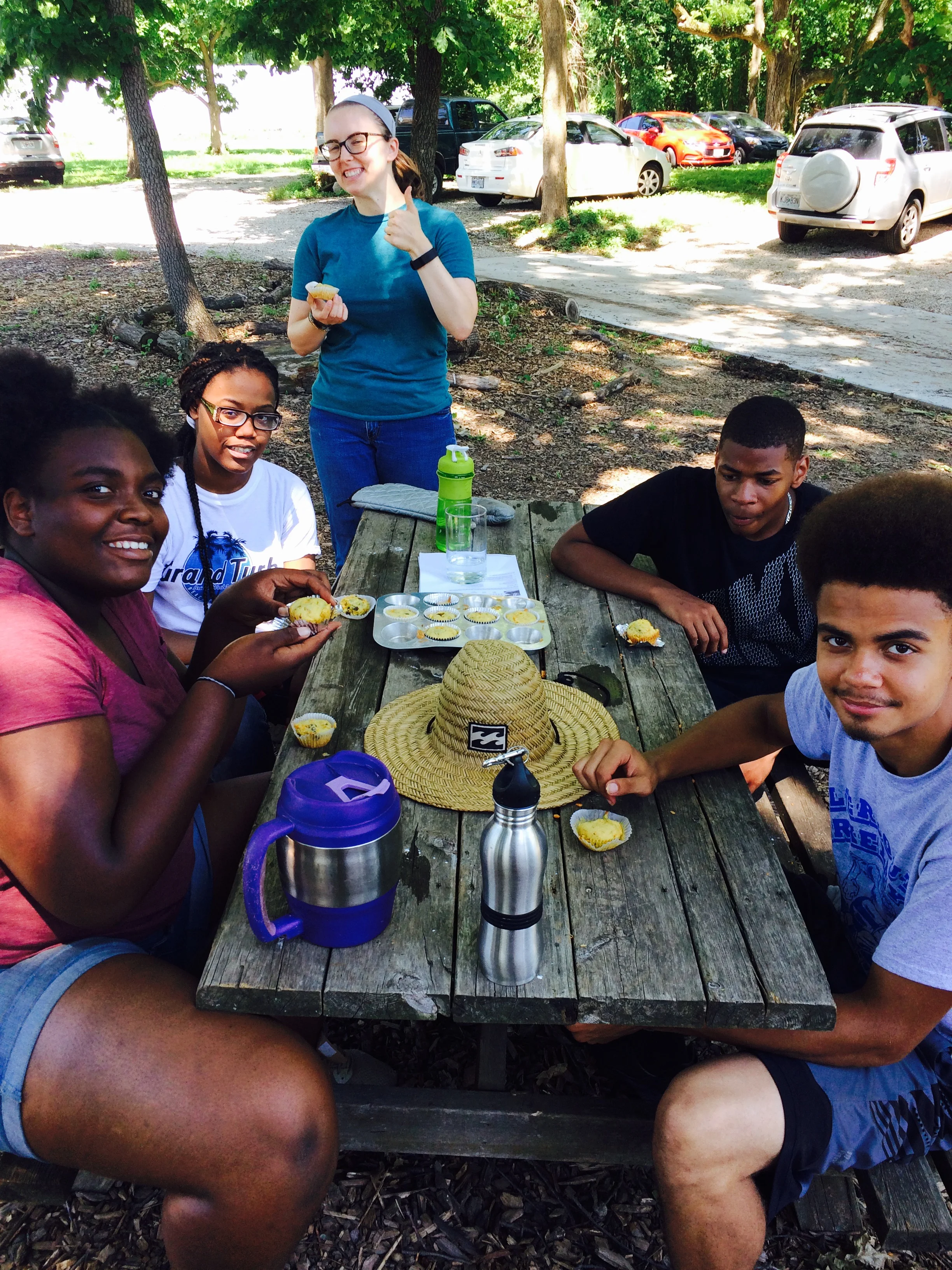 The Junior Farm Crew chows down on carrot muffins, fresh from the farm!