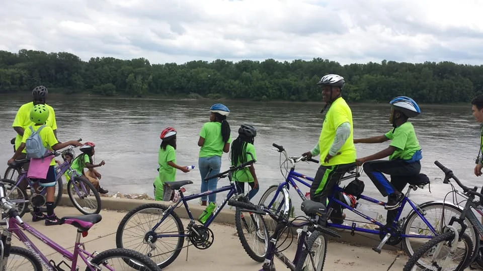 Campers and counselors rollin' down the riverfront!