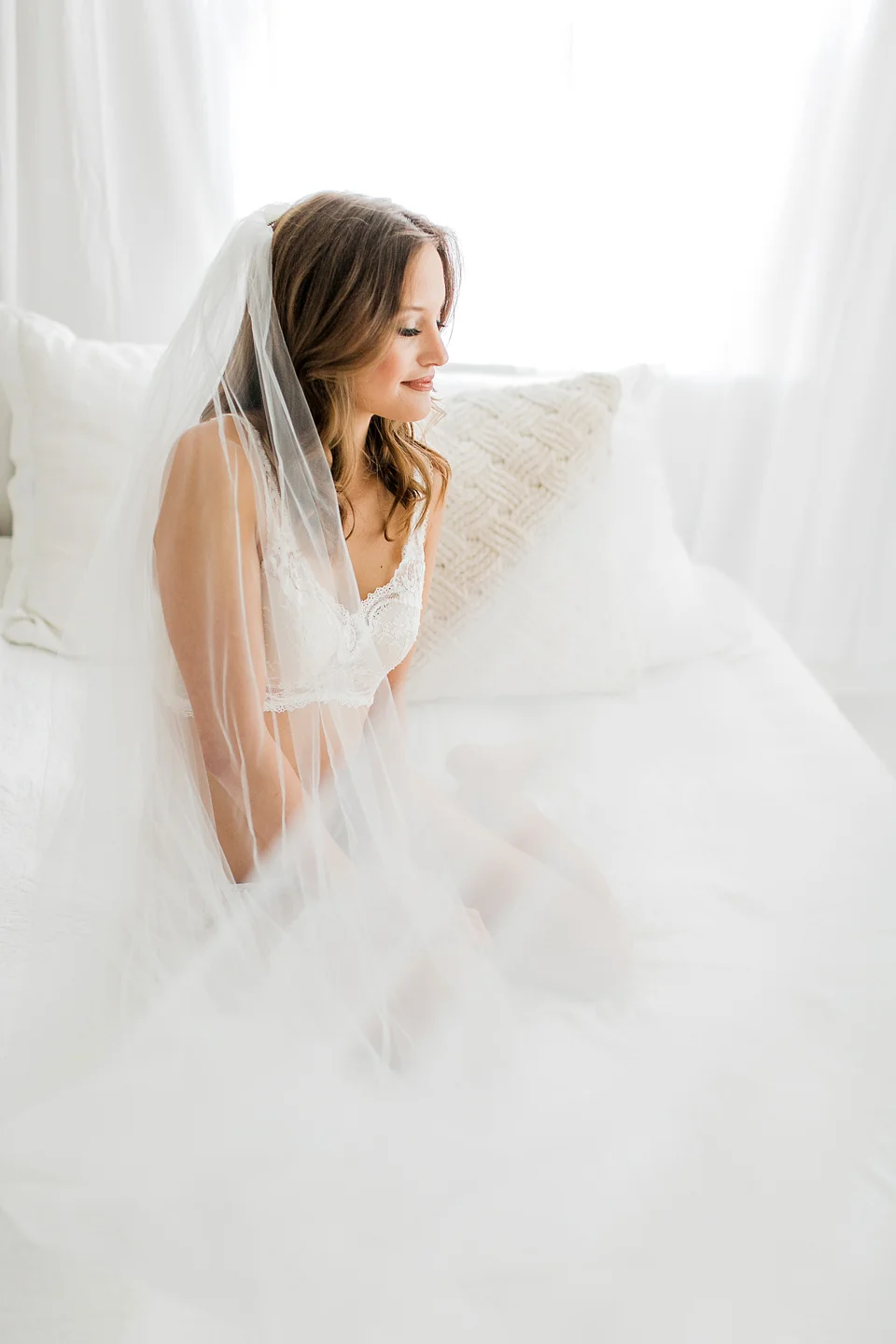 I chose Rachel for a mini session boudoir shoot, and I have never felt more comfortable and confident! I was super nervous and didn't know what to expect, but Rachel was SO fun to work with and made it so easy! I gifted the photos to my new husband the night before our wedding, and he said it is the best gift he has ever been given! The images are beautiful and tasteful and I am so so glad I stepped out of my comfort zone because I couldn't imagine a better wedding present for my now husband! - Jayde
