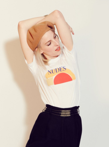 Never not classy. Nudes classic fit t-shirt plus a statement belt and high waisted black pant.
