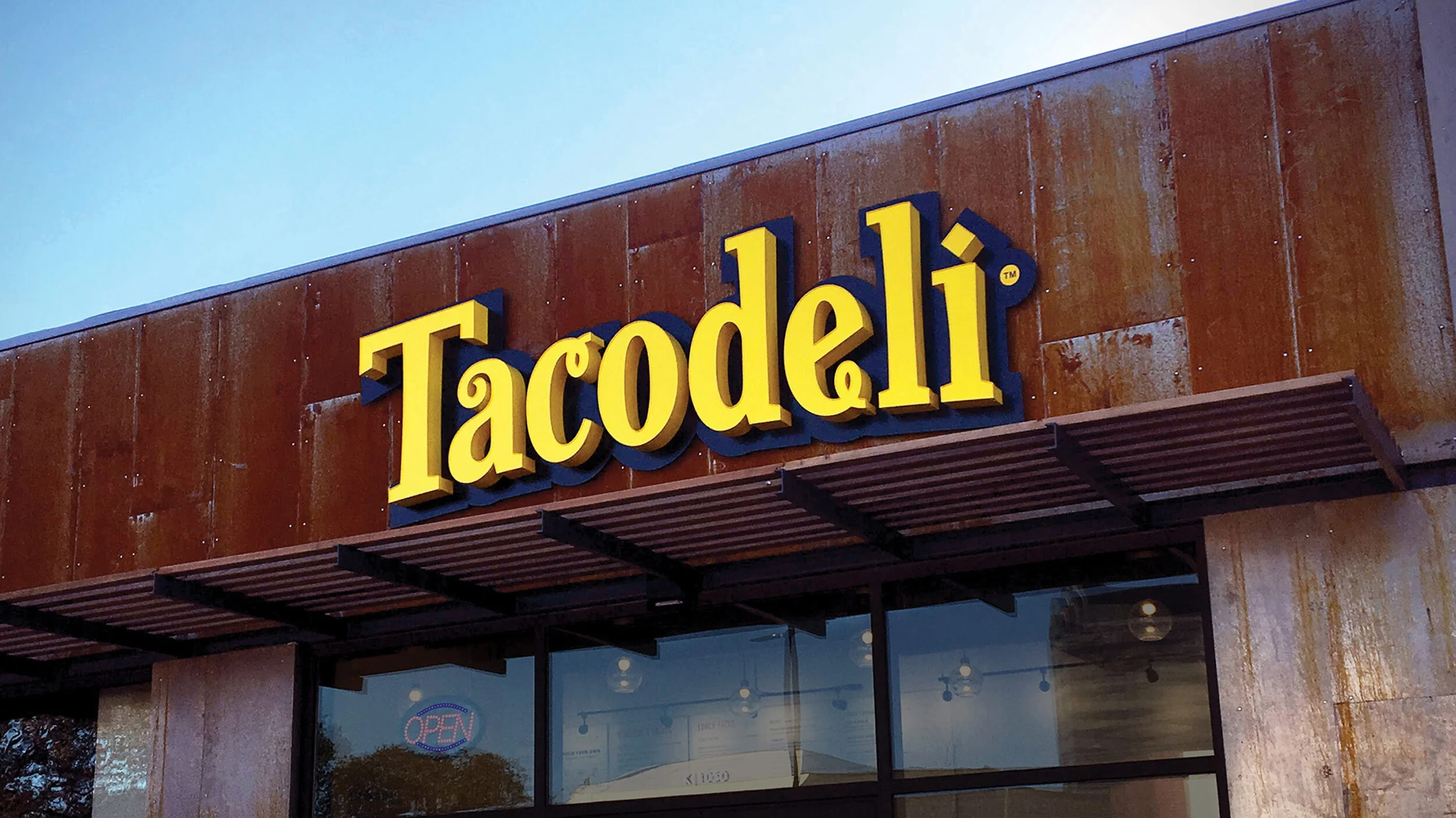 Experiencing the success of growth and expansion, Tacodeli realized their branding was holding them back. While working at the Butler Bros in Austin, Texas I updated their old logo and redrew all the letterforms, preserving the quirkiness of their original wordmark while modernizing it and improving its legibility and scalability. We introduced new patterning inspired Mexican ceramic tiles as well as an entire new brand system of typography, icons, and color. The new system was applied across all customer interactions such as packaging, environmental graphics, signage, and collateral. Credits: Creative Directors: Marty Butler, Adam Butler Design & Design Direction: Jacob Carter Copywriters: Jeremy Spencer, Erik Enberg Work completed at The Butler Bros in Austin, TX