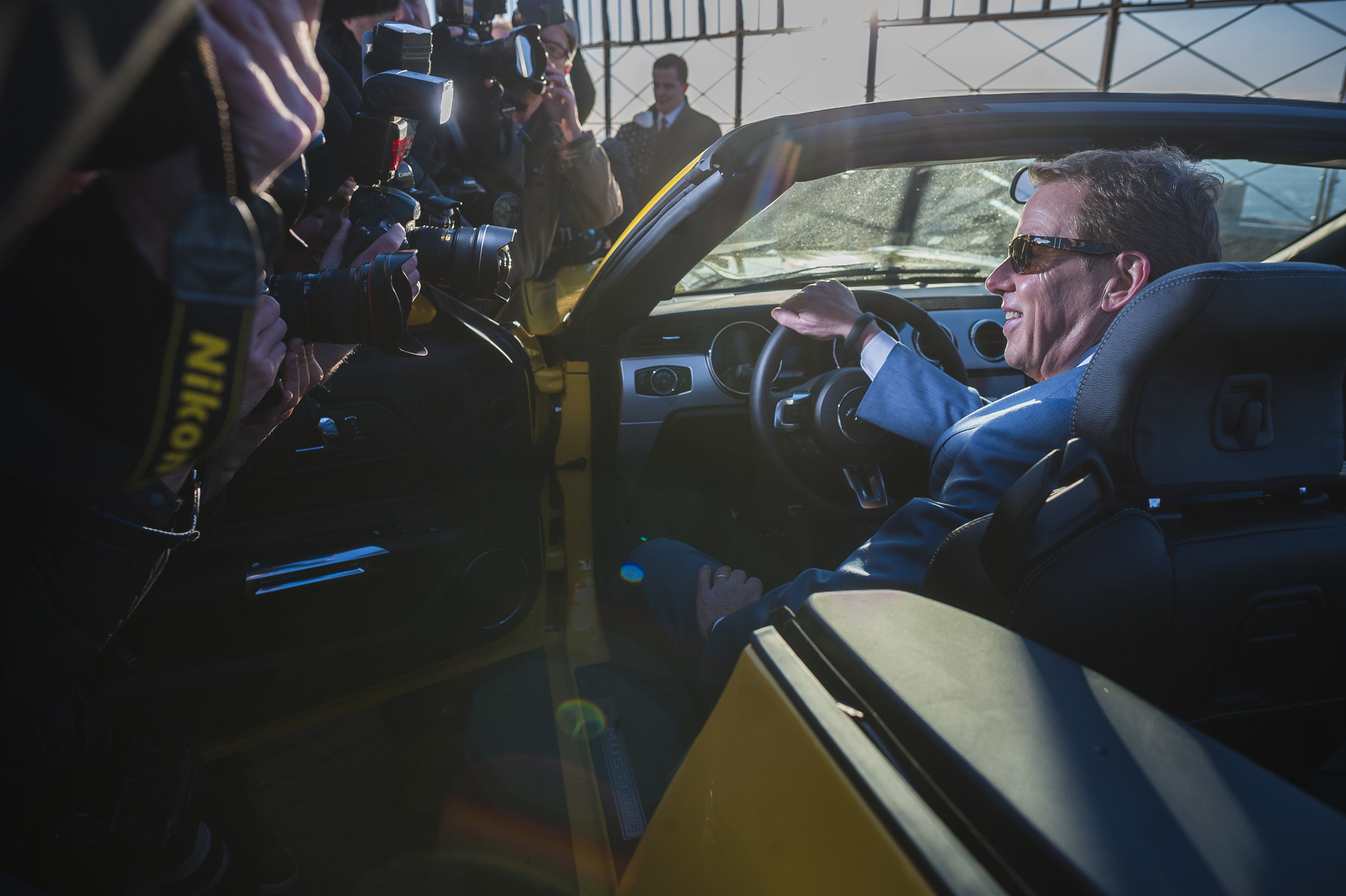  Ford Chairman Bill Ford sits behind the wheel of a 2015 Mustang GT during the car's unveiling on the observation deck of the Empire State Building in the Manhattan borough of New York. 