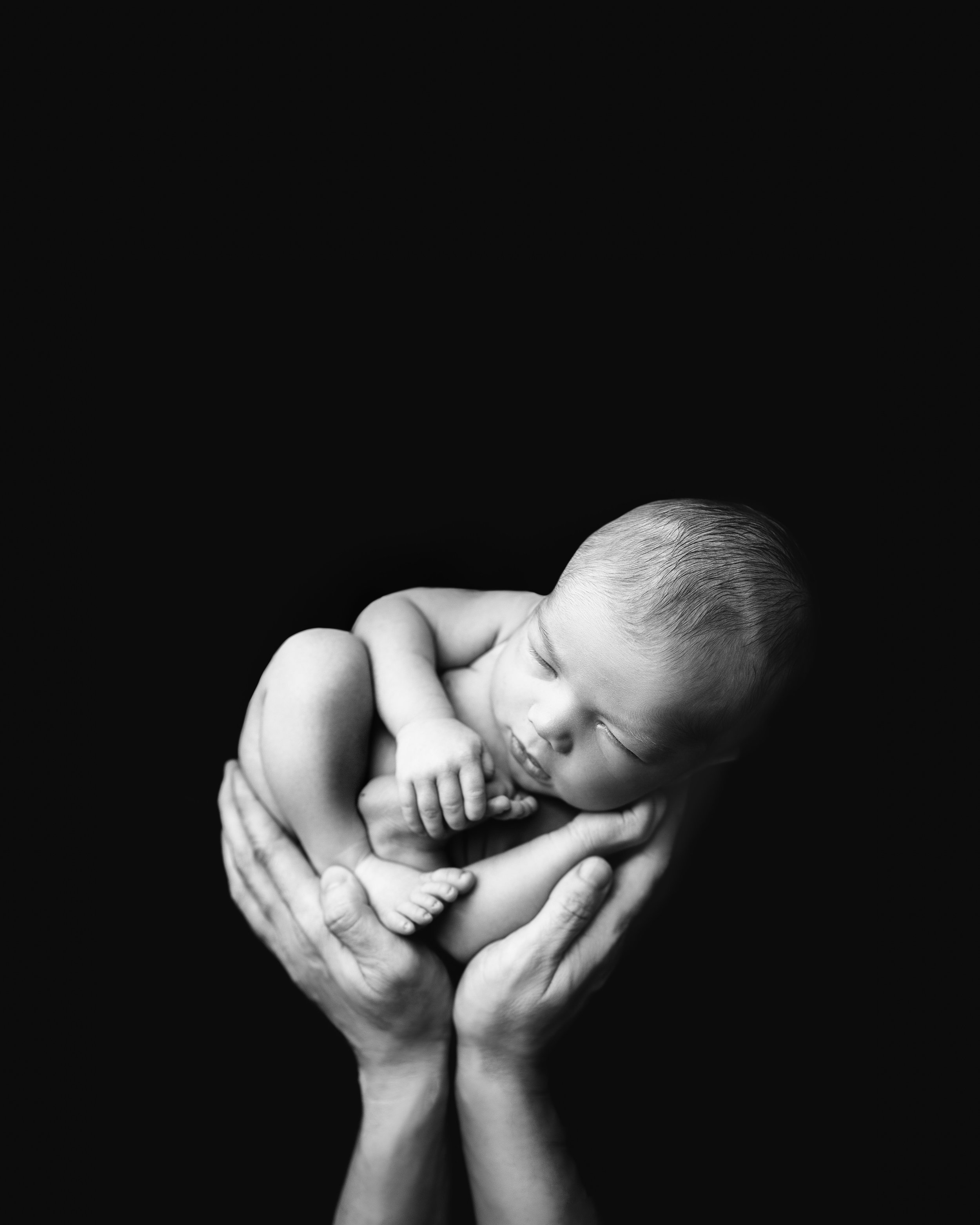 ct newborn-in hands.jpg