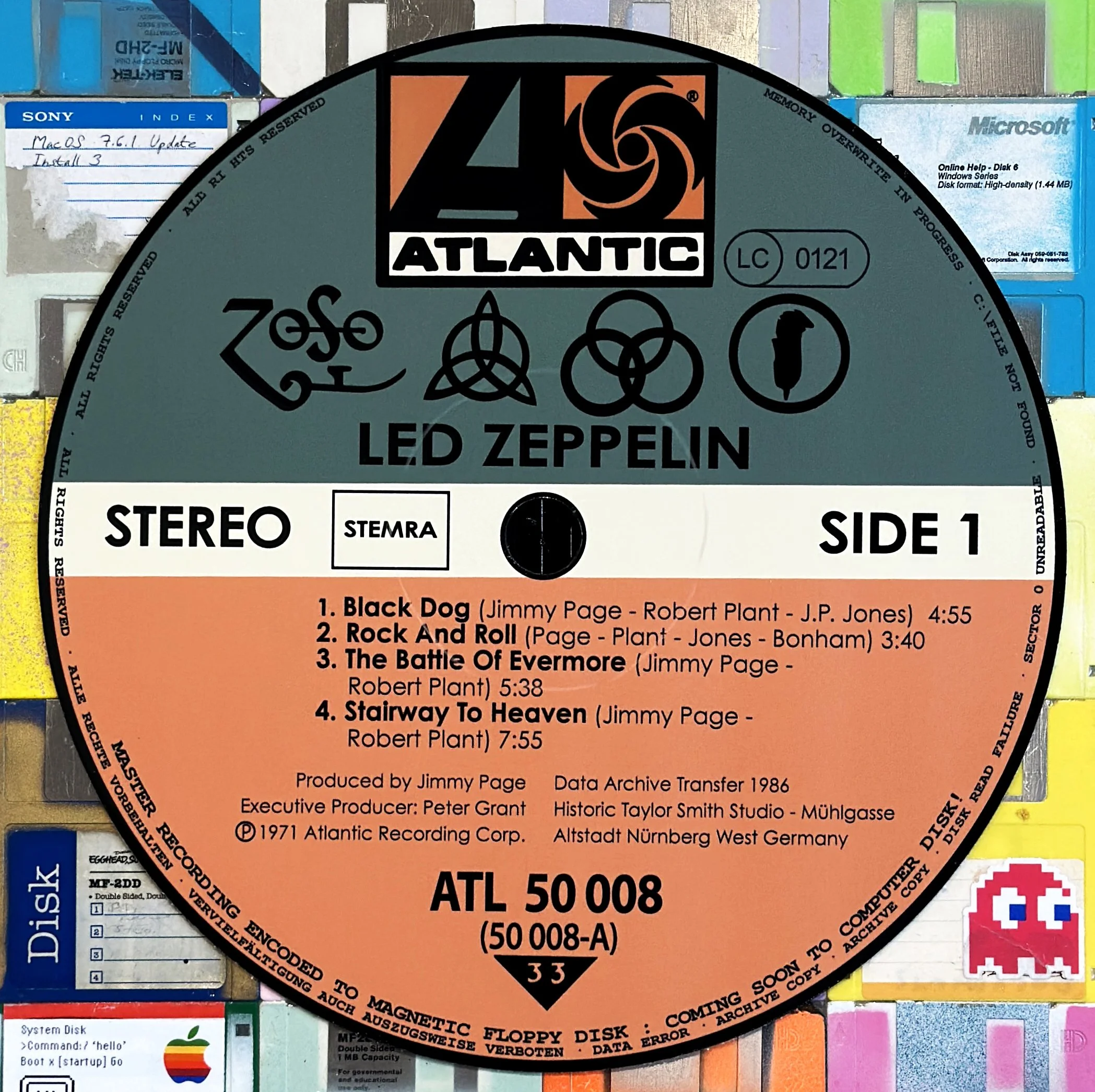 Detail view of Taylor Smith’s Led Zeppelin IV (Side 1) v2.0 mixed-media Vinyl Series artwork, constructed from vintage 3.5-inch floppy disks with a custom aluminum center disc.