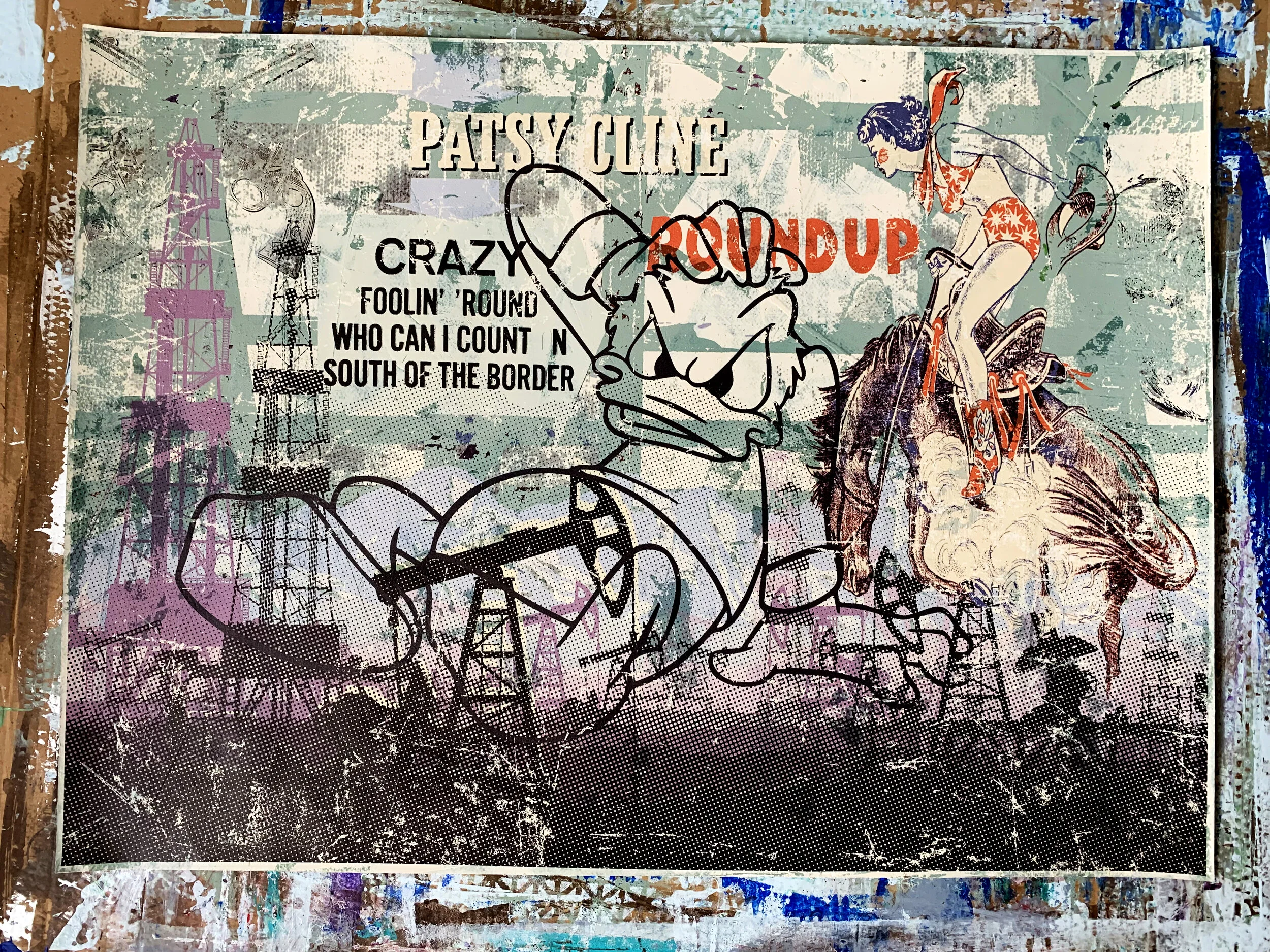 Oil Field Disaster with Donald Duck in progress on studio work table by contemporary pop artist Taylor Smith.jpg