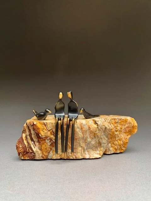 Boy and Girl With Two Birds