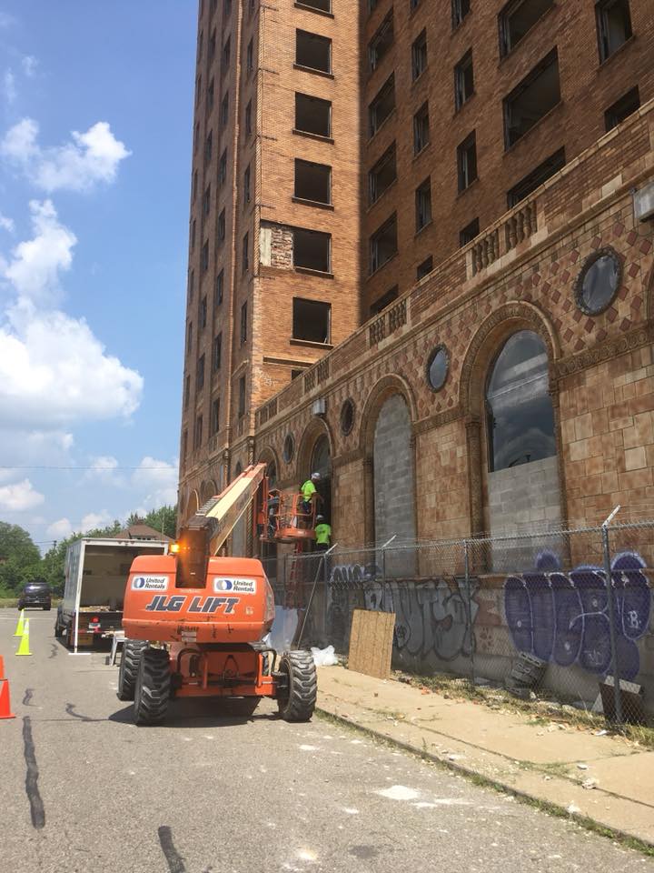 Workers beginning to seal up the property on July 25, 2018. Photo by Eric Hergenreder.