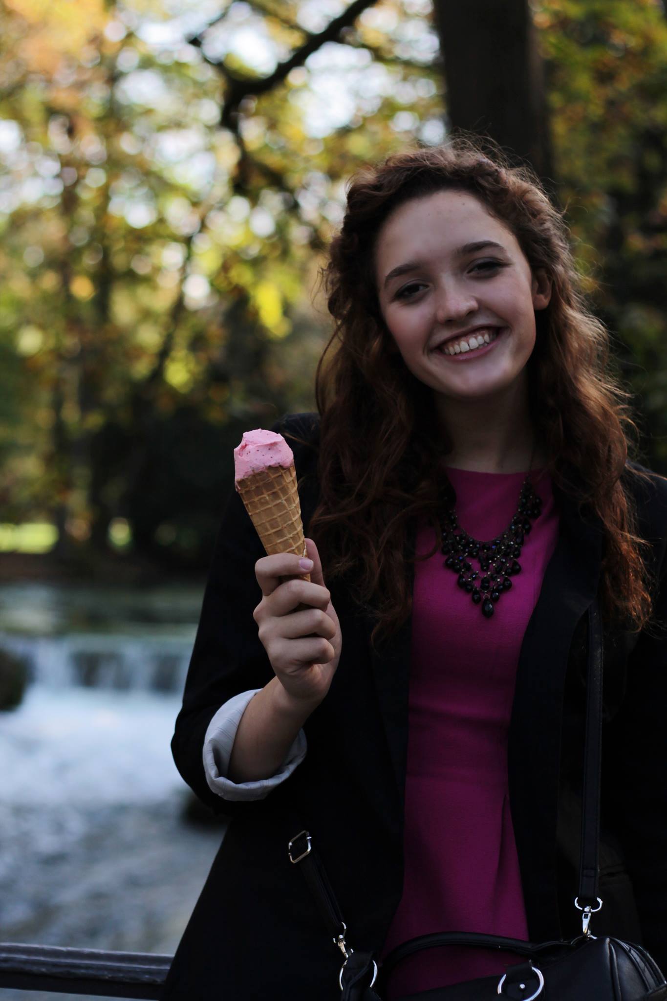 girl holding ice cream looking at camera look for the light photo video celine reese