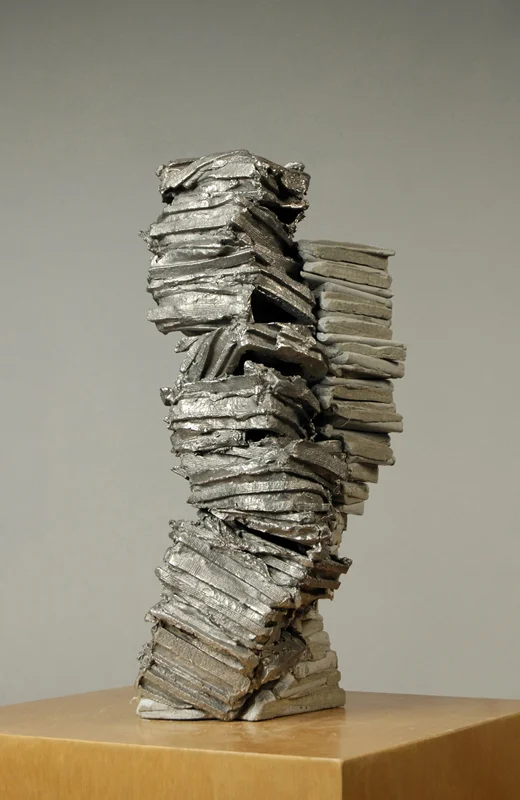 Boxing Lines 3 , 2013, Cast stainless steel and concrete, 21 x 10 x 5 inches Private collection