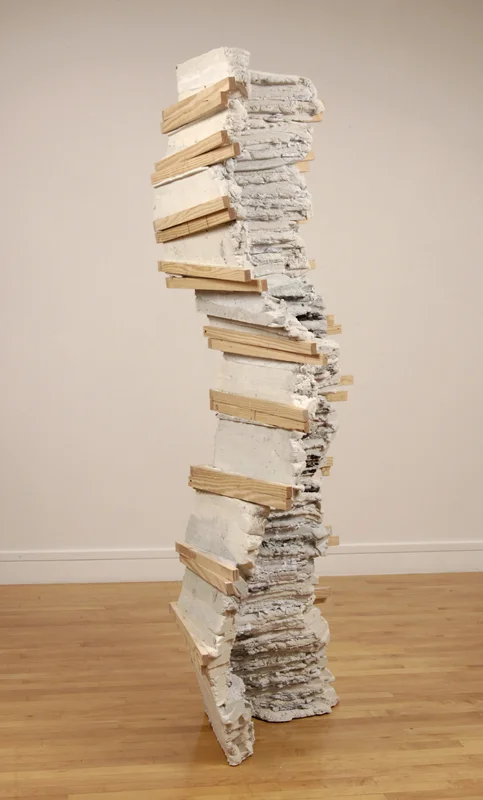 Madame George , 2010, concrete, wood, and paper pulp, 80 x 21 x 21 inches