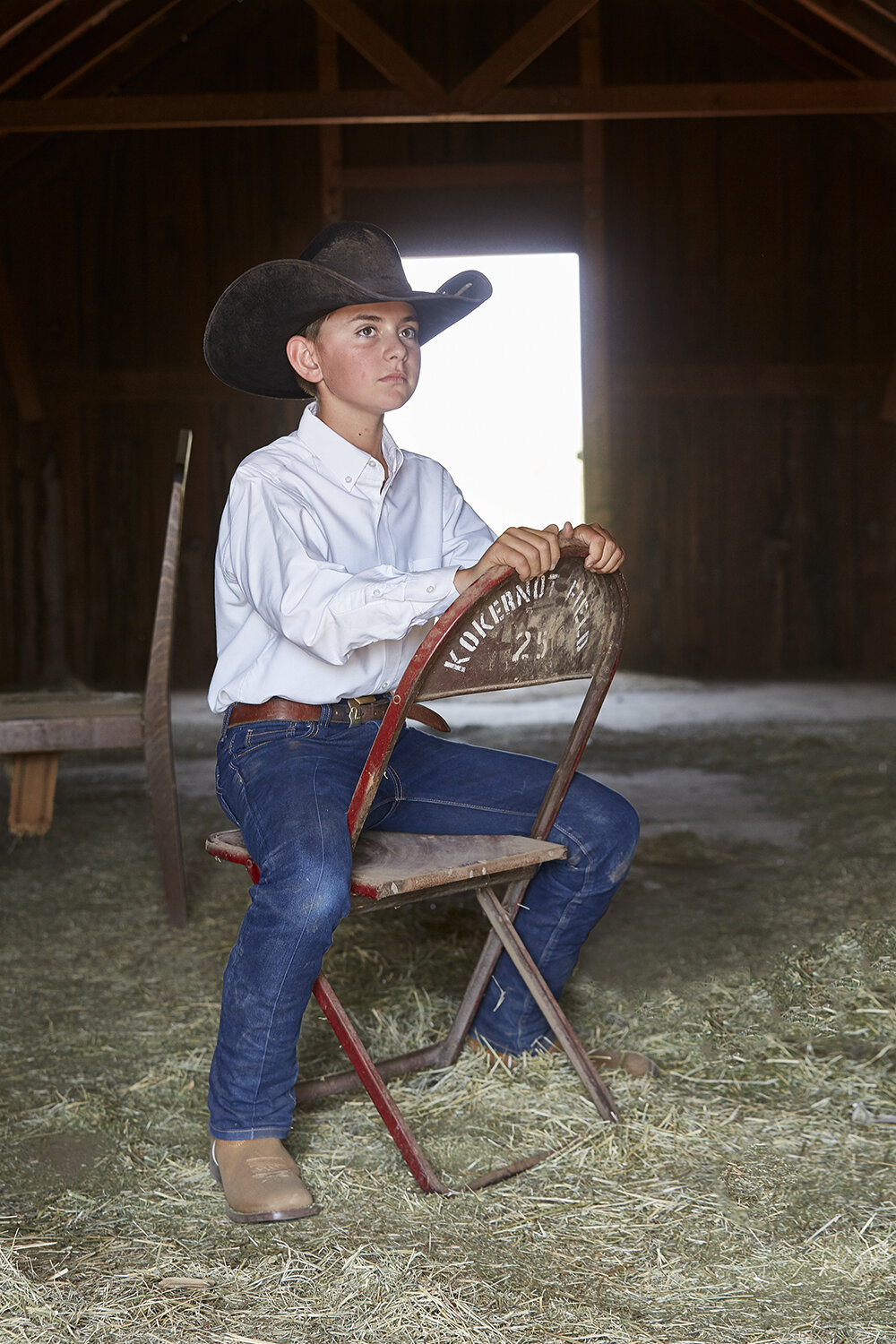 Young Cowboy in hay loft
