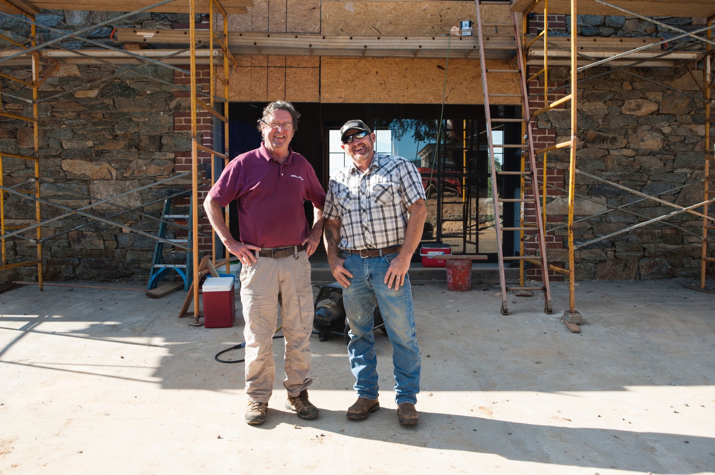  Allen Cochran with builder Tom Greer outside the barn's upper level. 
