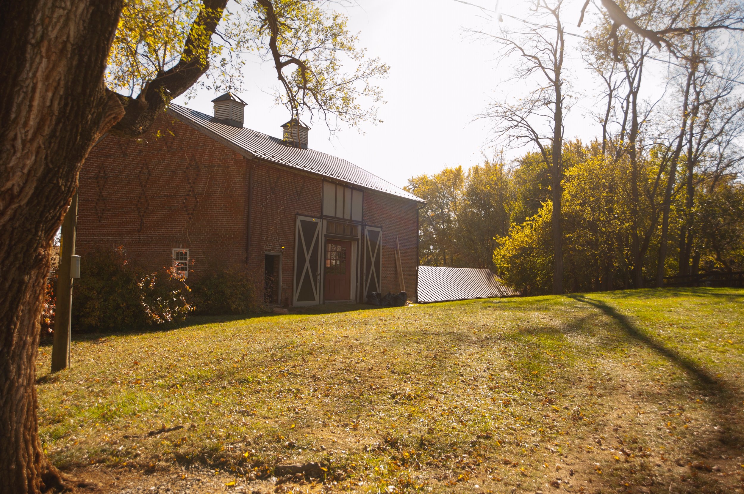  The one-story entrance to the barn's upper level. 