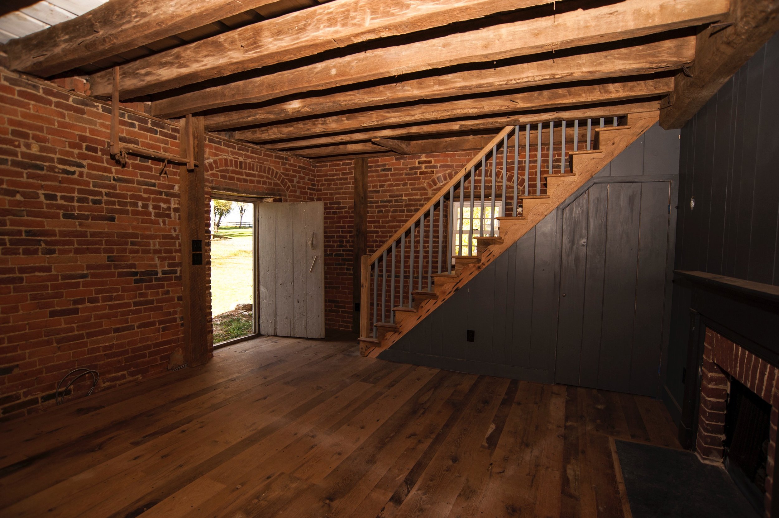  Stairway from the sitting area up to the entertainment space. 