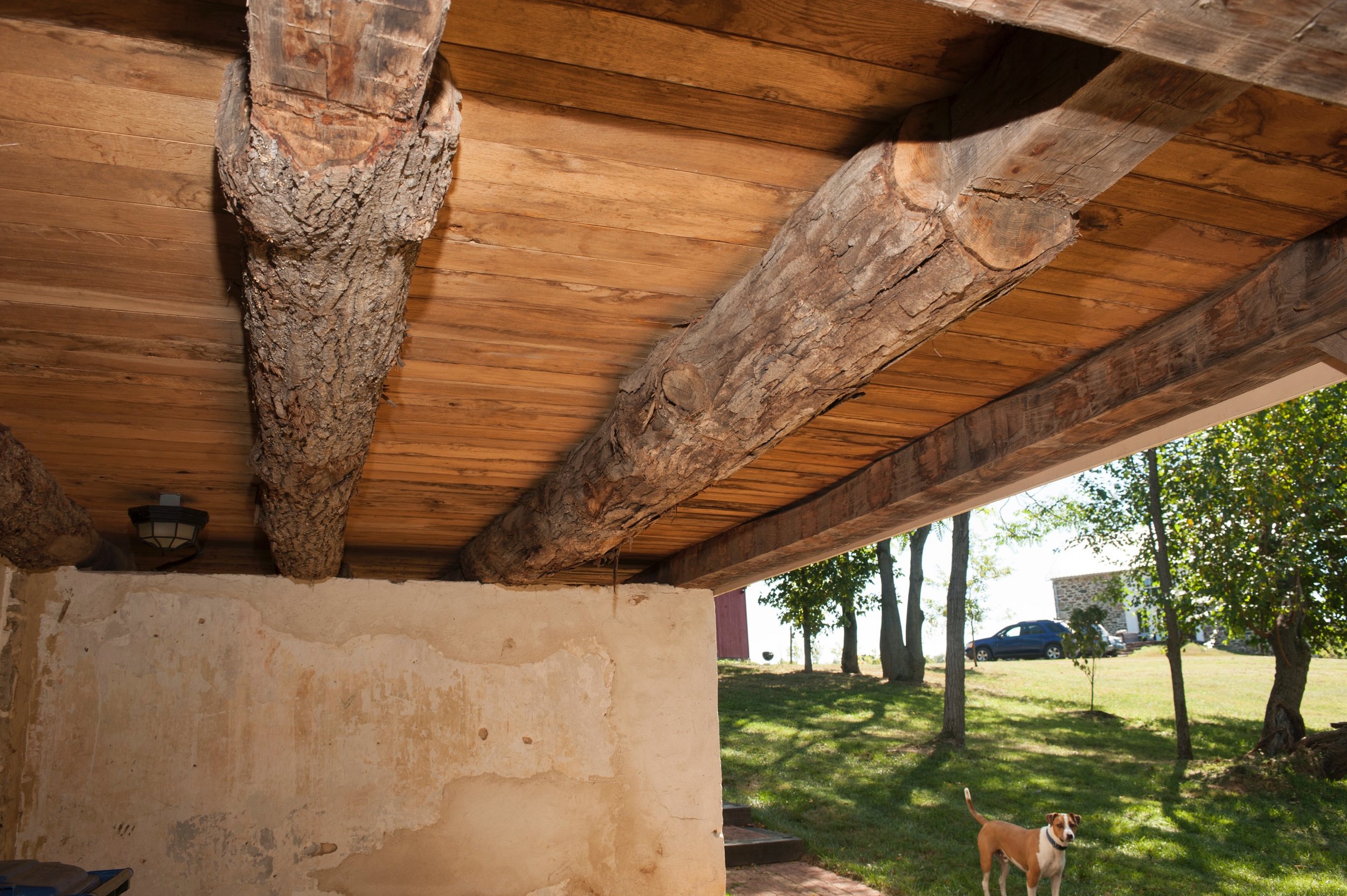  Hand hewn beams support porch. 