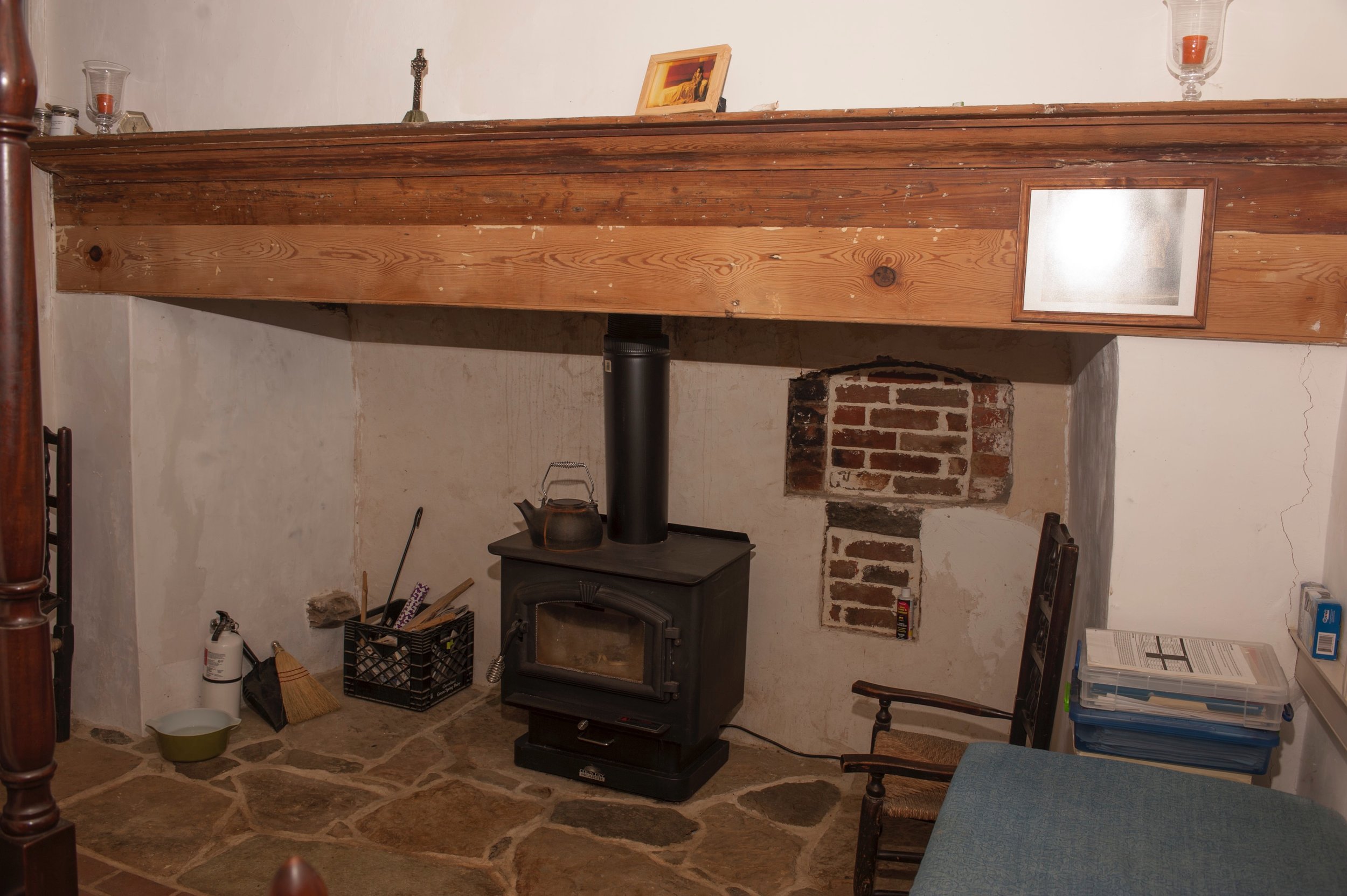  Bedroom fireplace features a bricked-in beehive oven. 