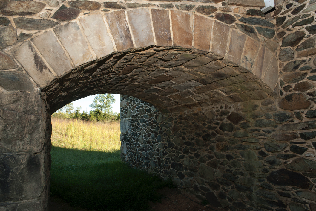  The stone arch supports the barn ramp. 