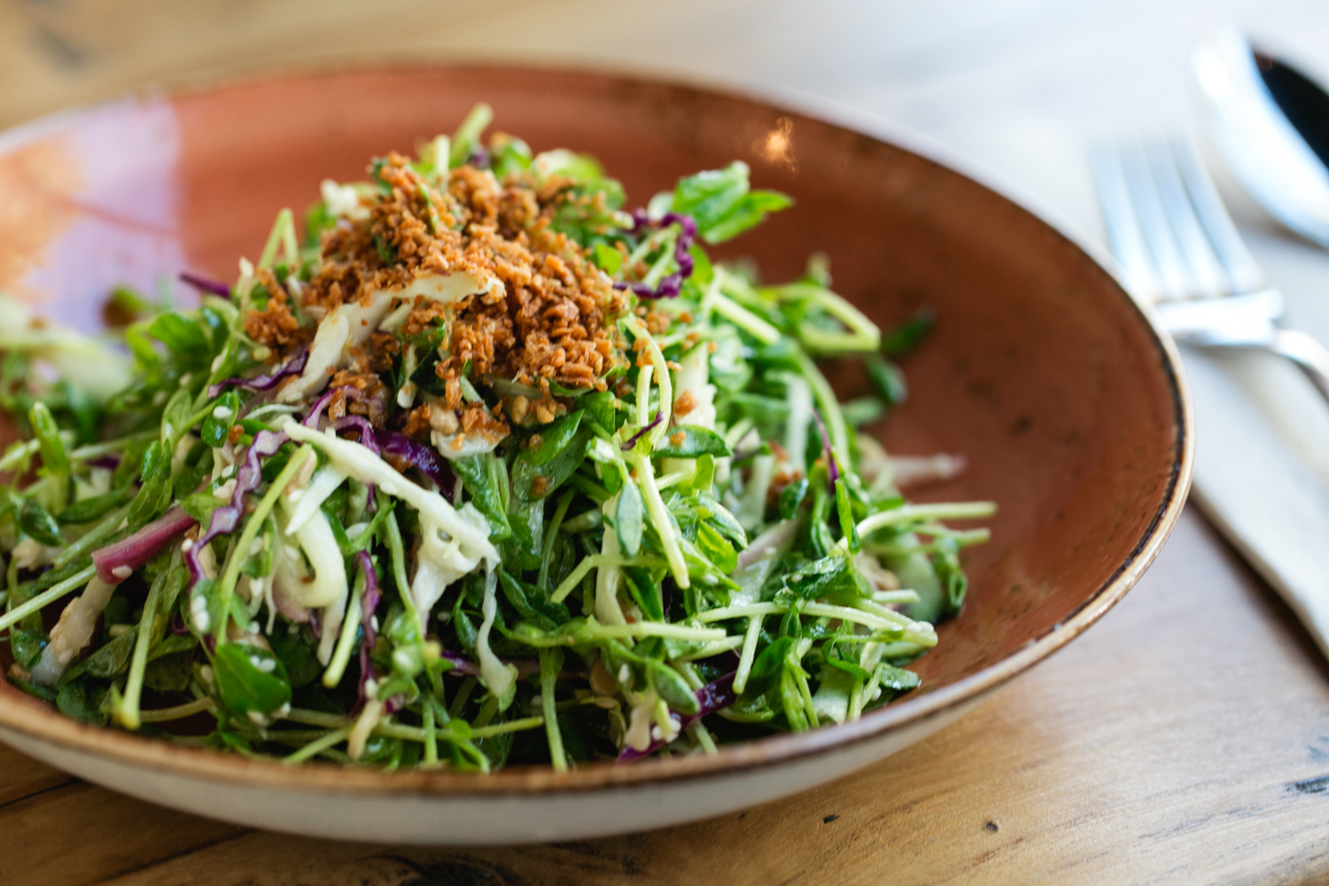 Teni East Kitchen pea shoot salad