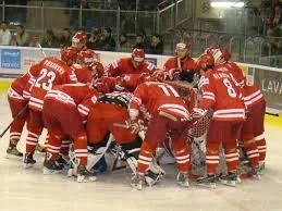 This team isn't discussing tactics, they'r e looking at their new dental plan to see if it includes veneers.