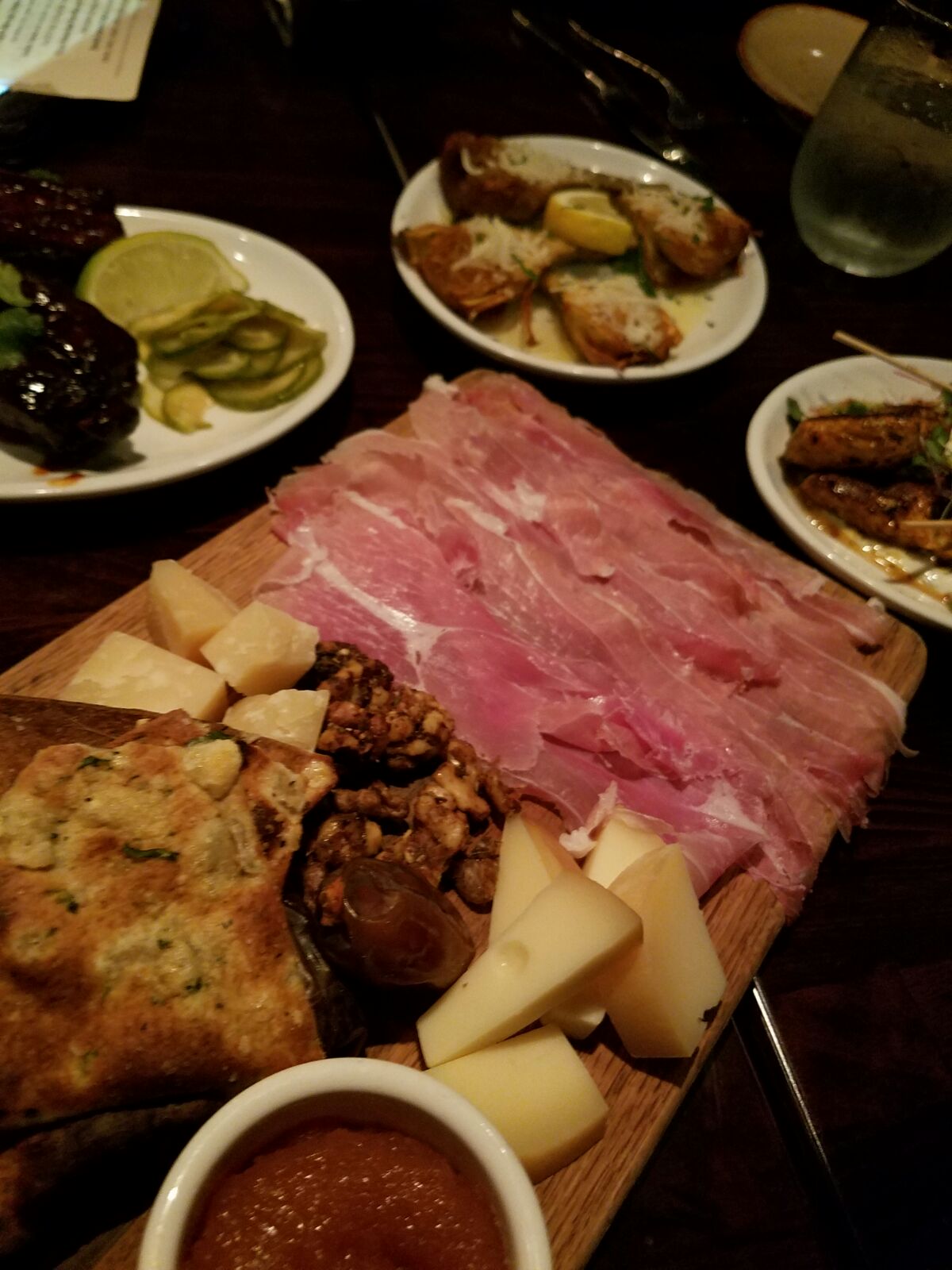 jamon iberico. parmesan reggiano. san simon: UNDER THE CORK TREE.
