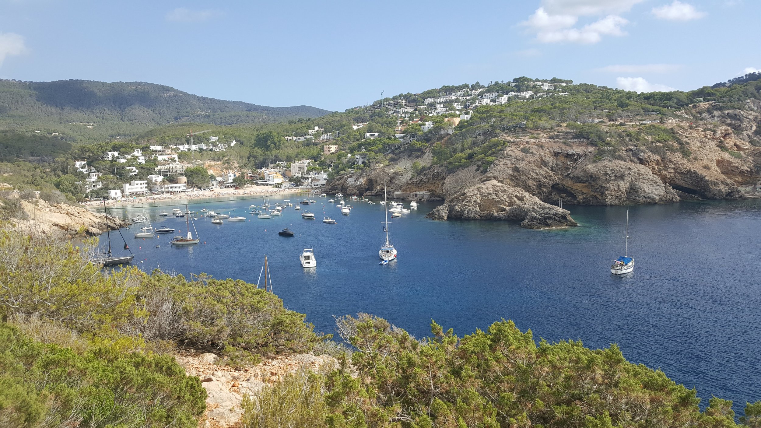 Below to the left is beach we were on in Ibiza: MADRID.