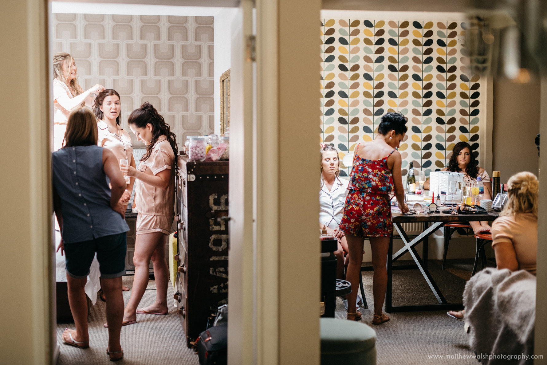 A reportage image of the bride and bridesmaids all getting ready 