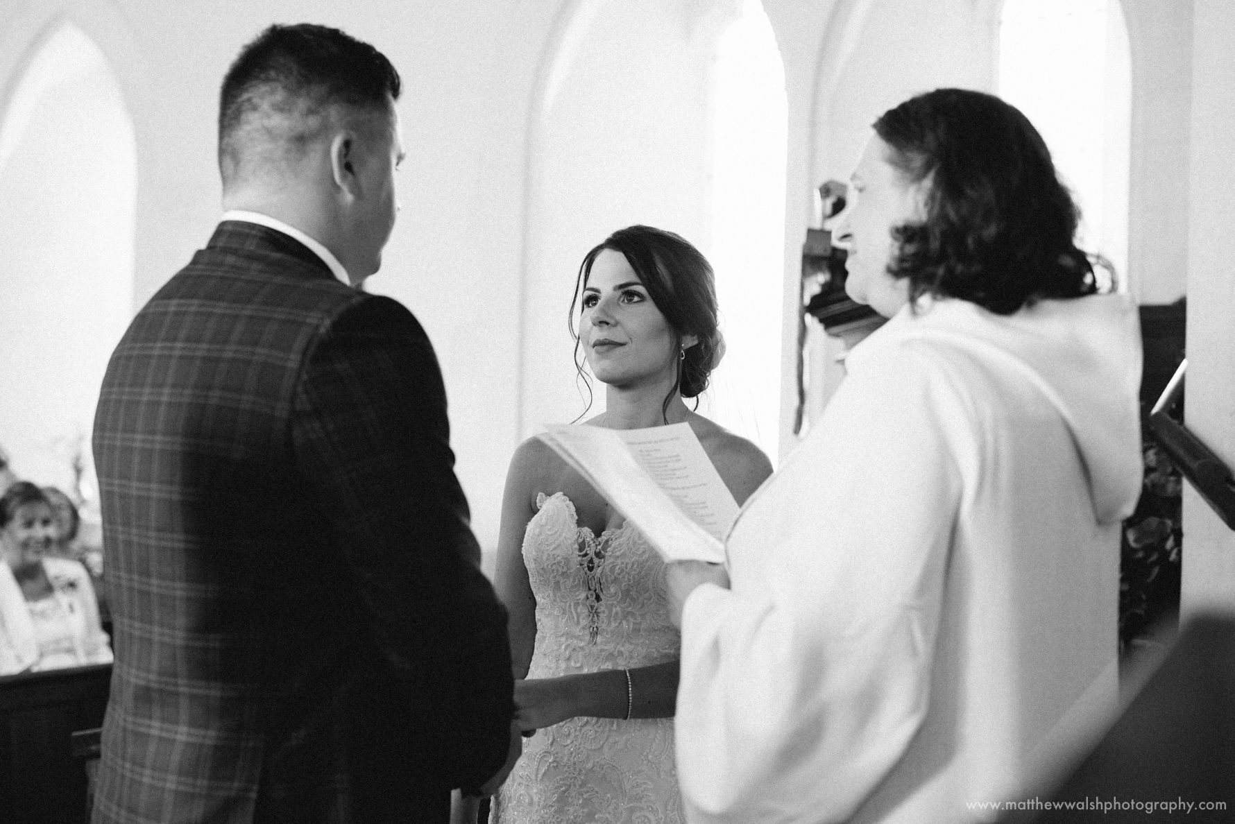 Bride and groom make their wedding vows