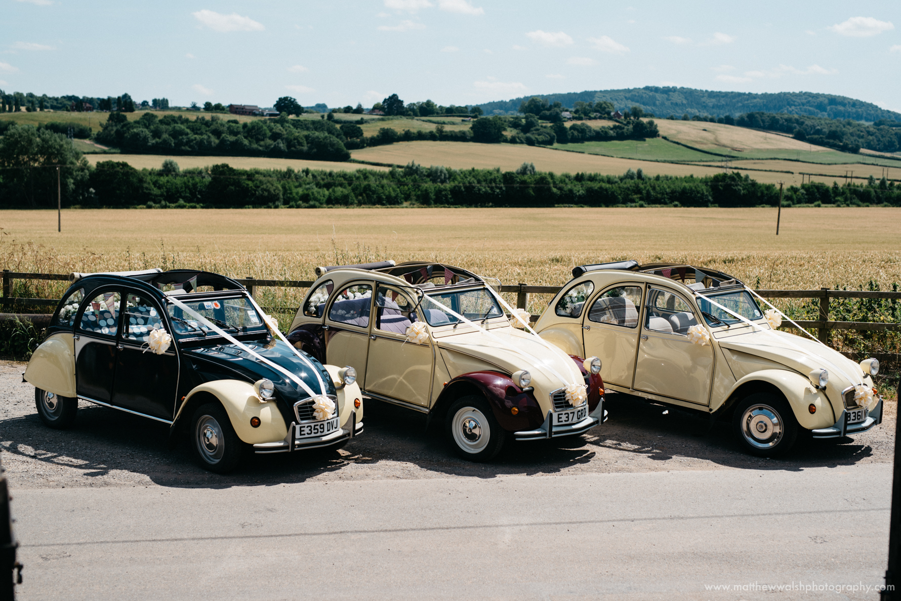 2Cv Wedding cars lined up outside the church