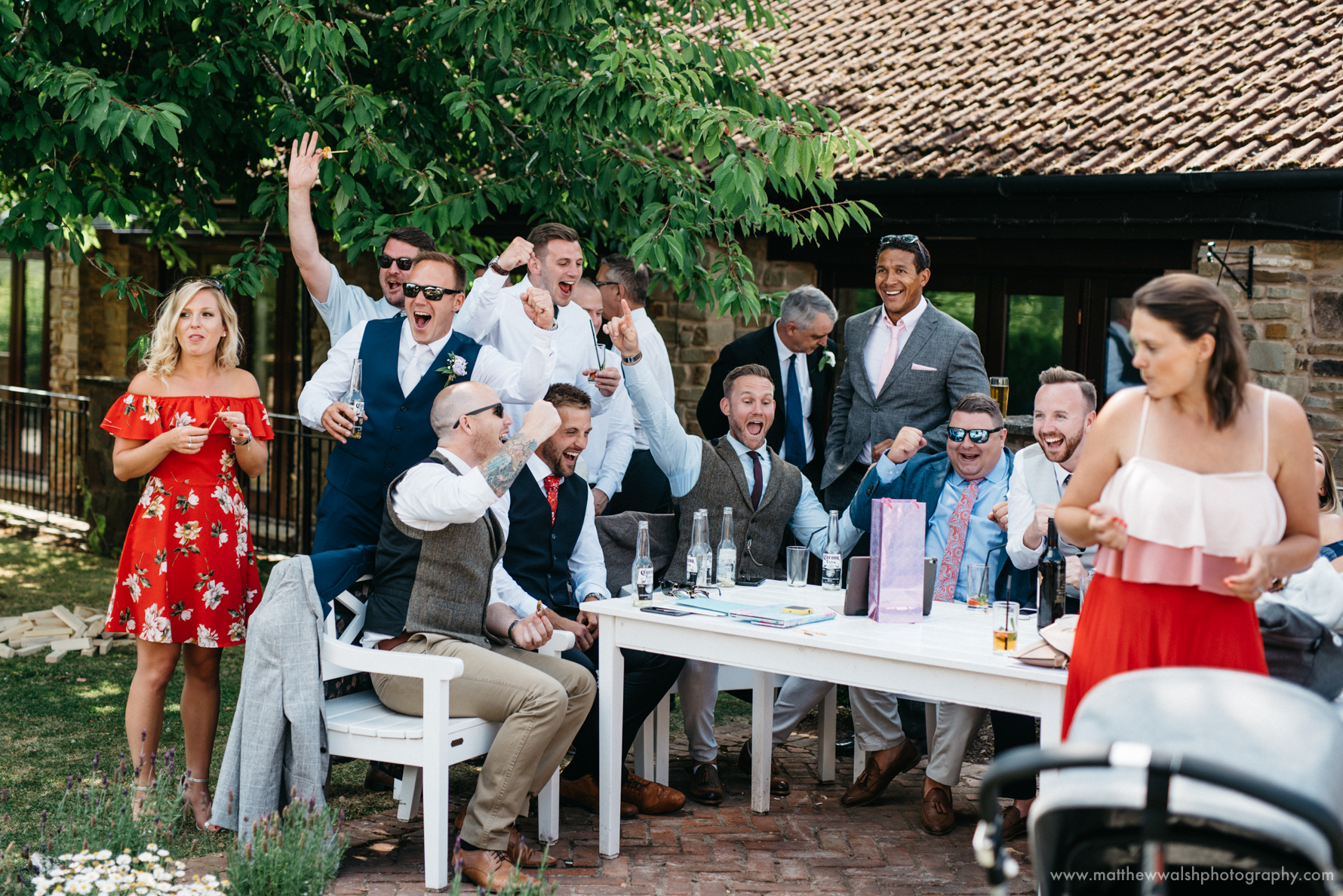 Guests celebrate as England score during a documentary style unposed photograph