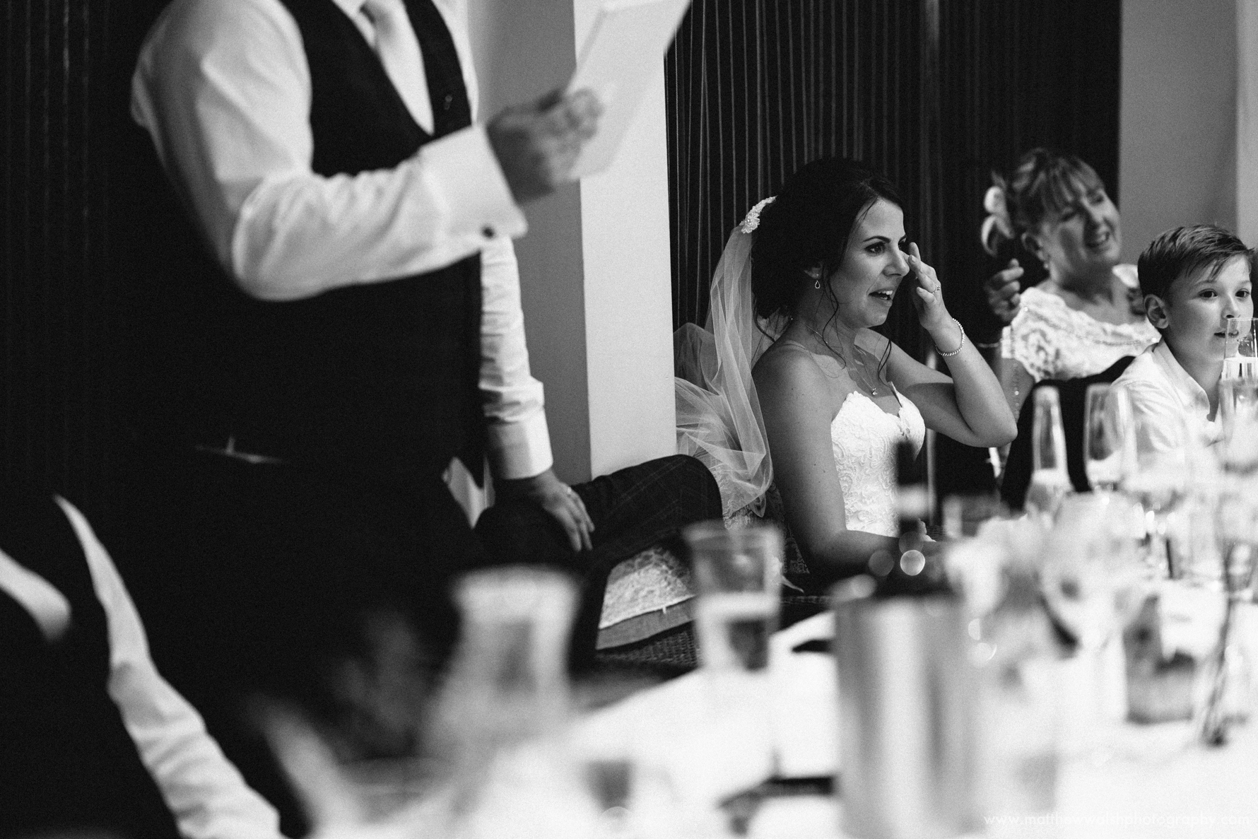 A hilarious moment makes the bride shed a tear