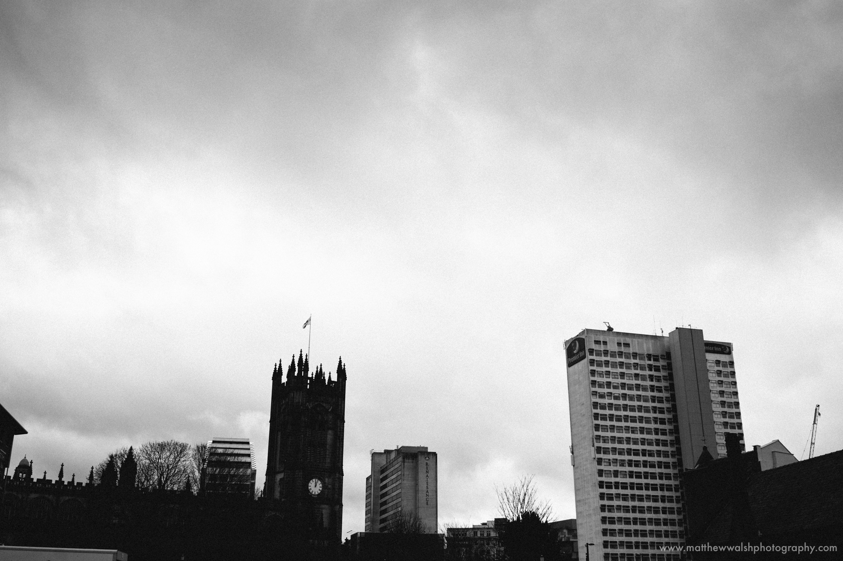 Manchester skyline on a gloomy January day adding context to the story of the day