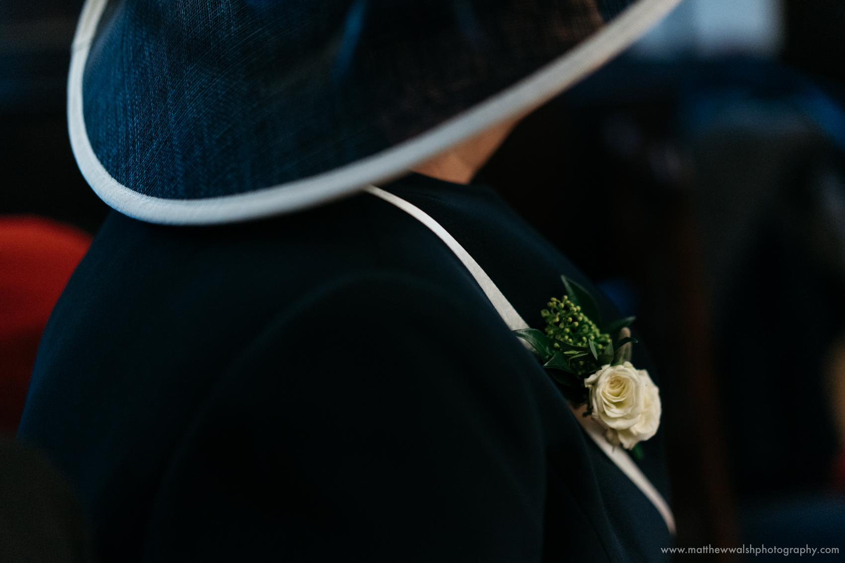 Curves and shapes with a floral detail, just a little observation of the mother of the brides hat