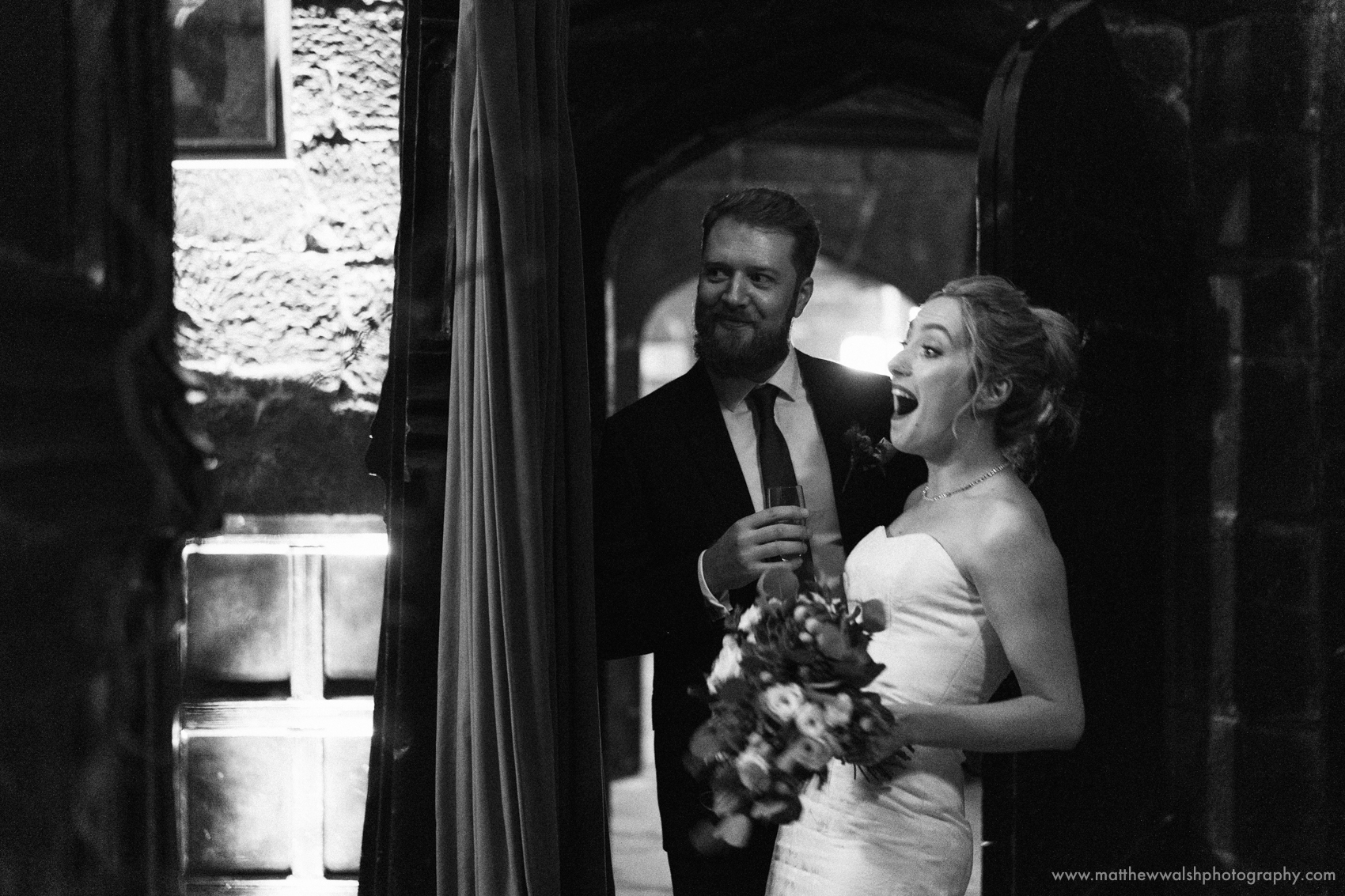 The bride certainly finds something funny
