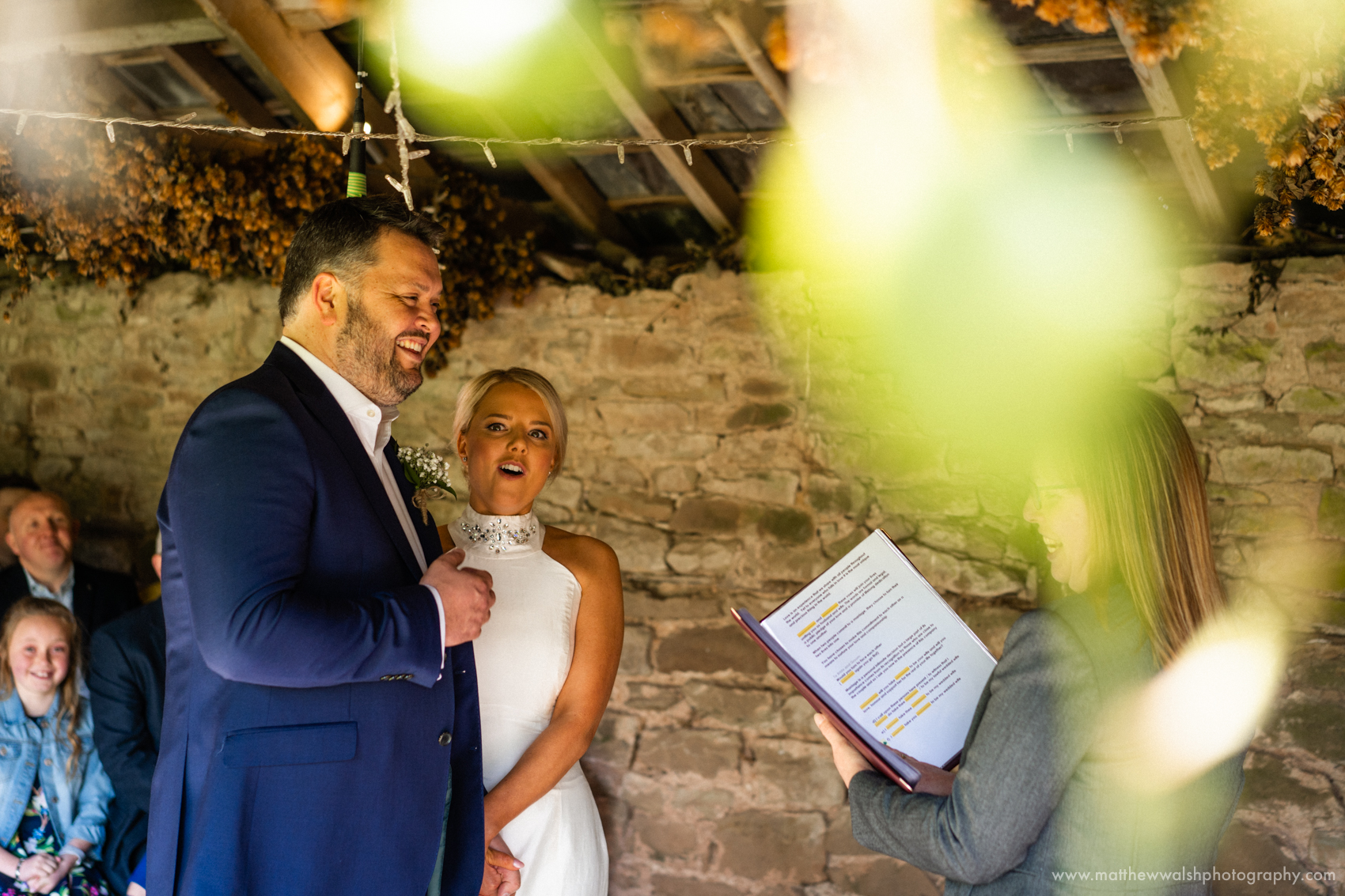 The bride and groom saying their vows