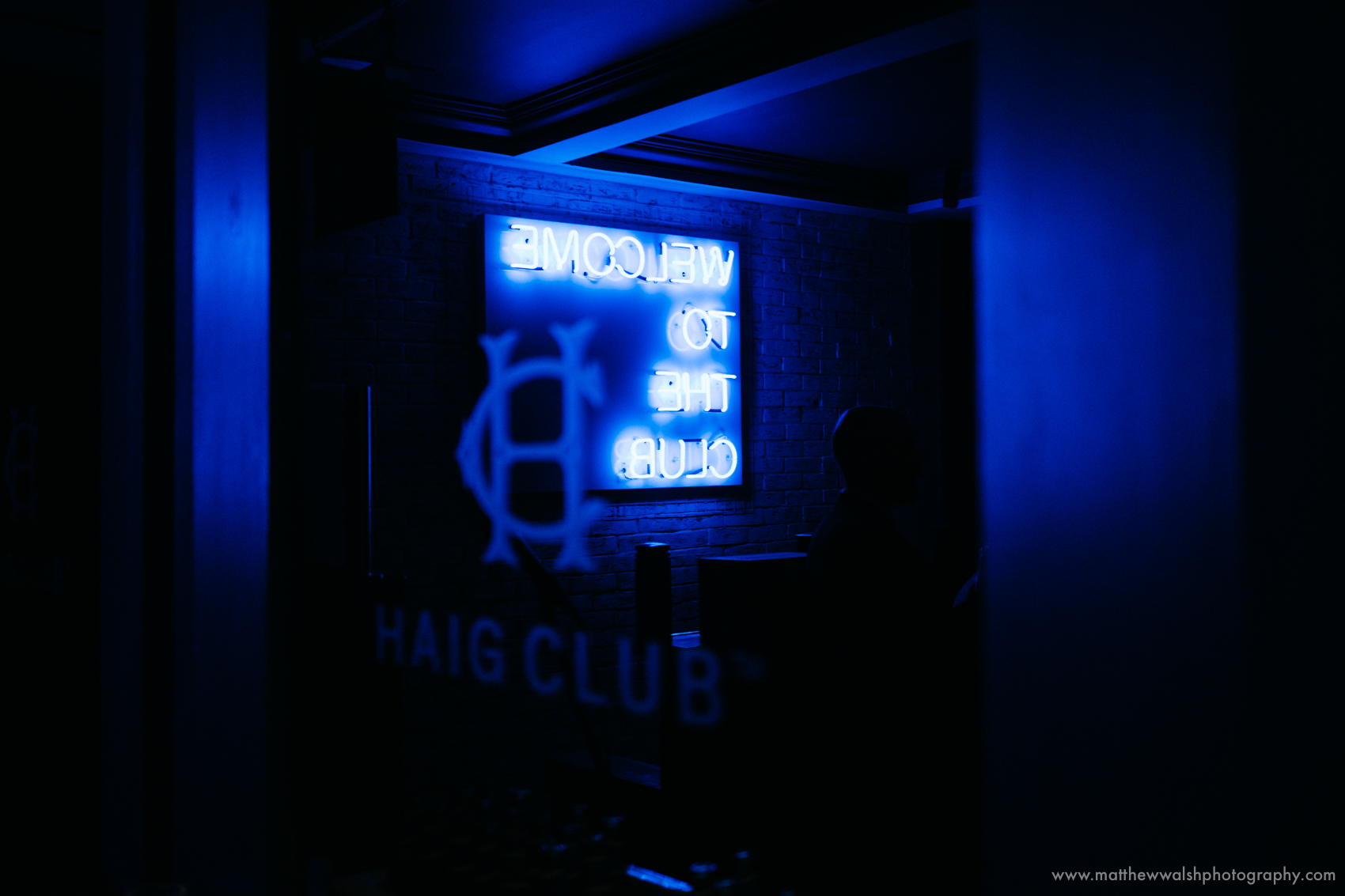 Welcome to the club - neon sign for the Haig Club Manchester