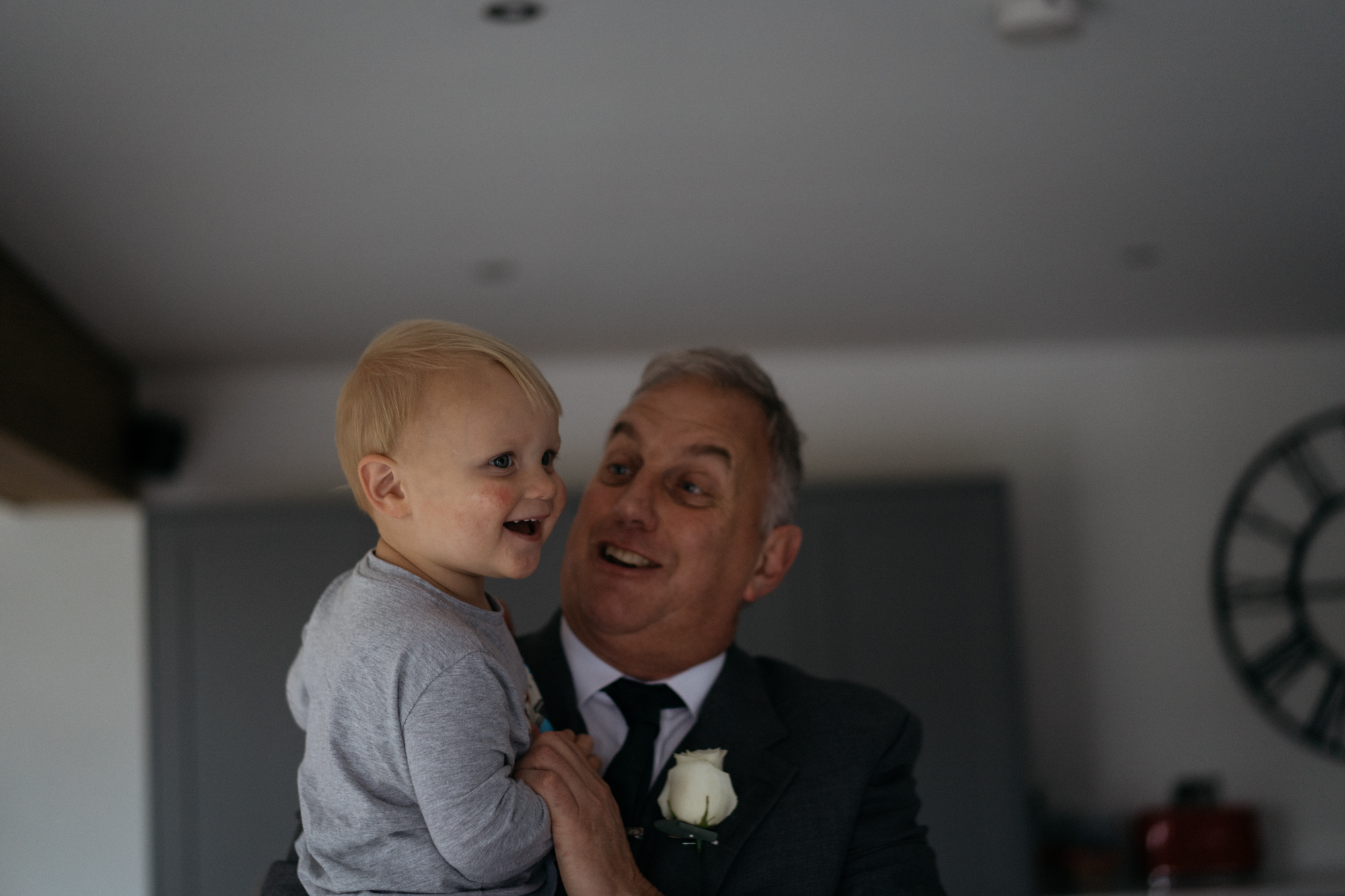 A little boy happy to be with his grandfather