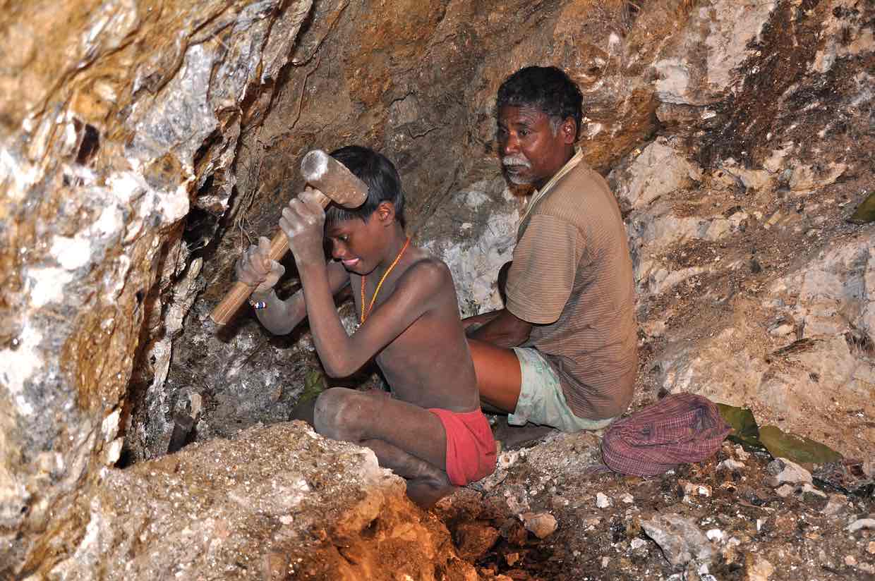  From 2013, seven-year-old Karulal works with his father in a mica mine. -- The Guardian, Peter Bengtsen