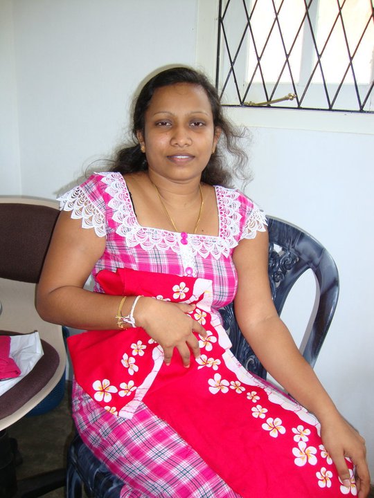 Chaini with the fabric we have designed and she got printed for our new uniform for the Frangipani Pre-school - we have had the Frangipani flower printed and are using Batik fabric so the dresses will be unlike any others around!