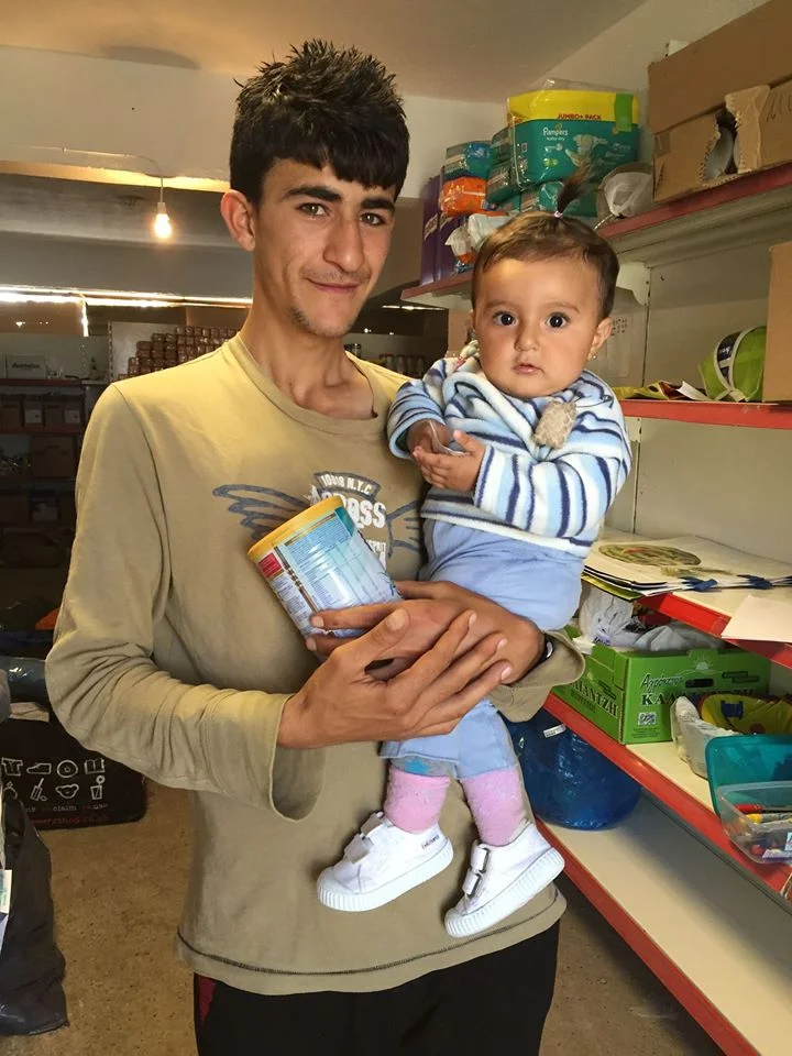 a beautiful little baby who came to see me everyday in the 'free' shop with her daddy and the milk powder we provide.