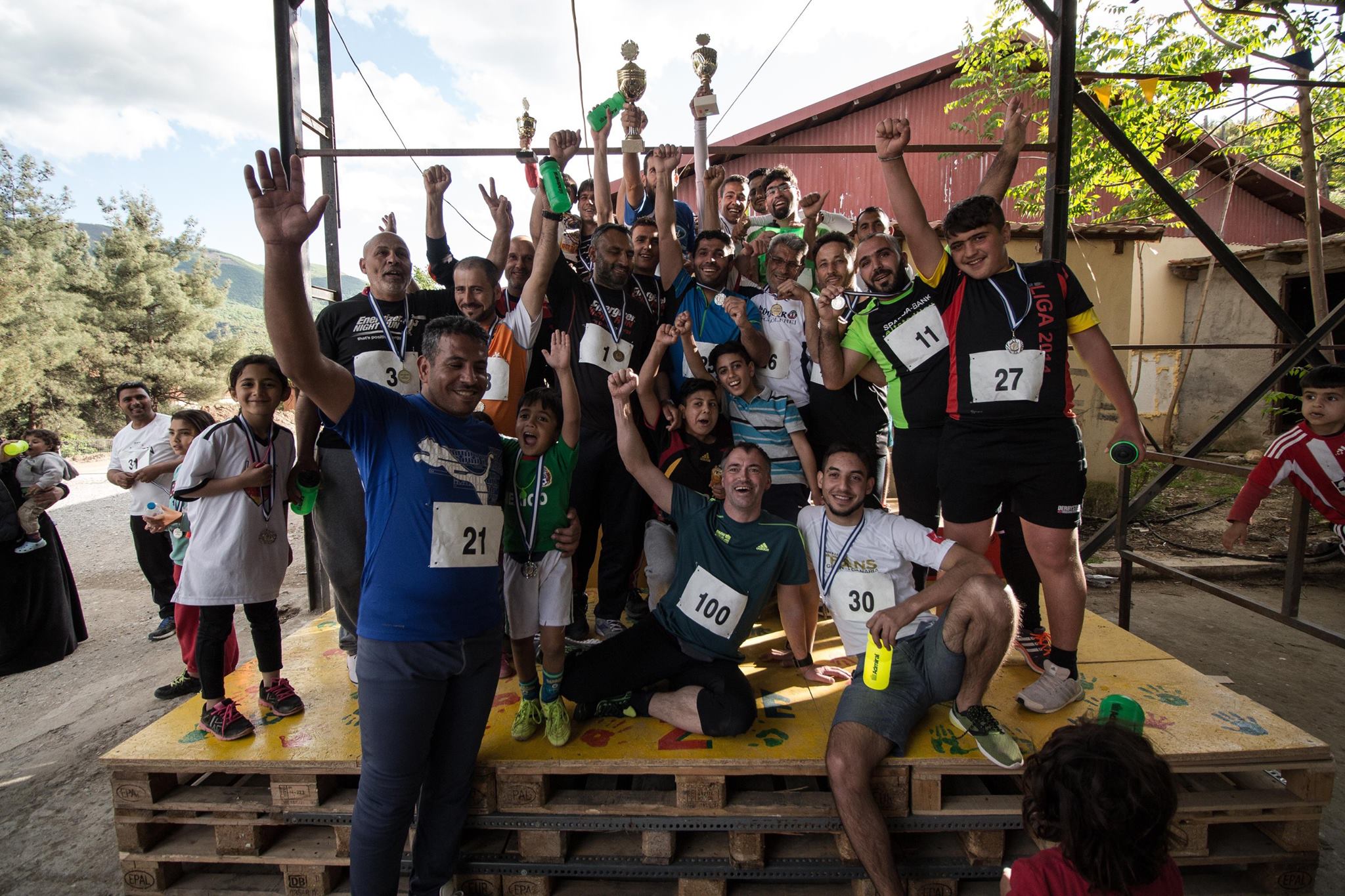 Christian Elm-Hartwig held running training for a week. He gave everyone shoes and clothing, and at the end of his stay he held a running race with medals! Presented on the stage built by our volunteers :) 