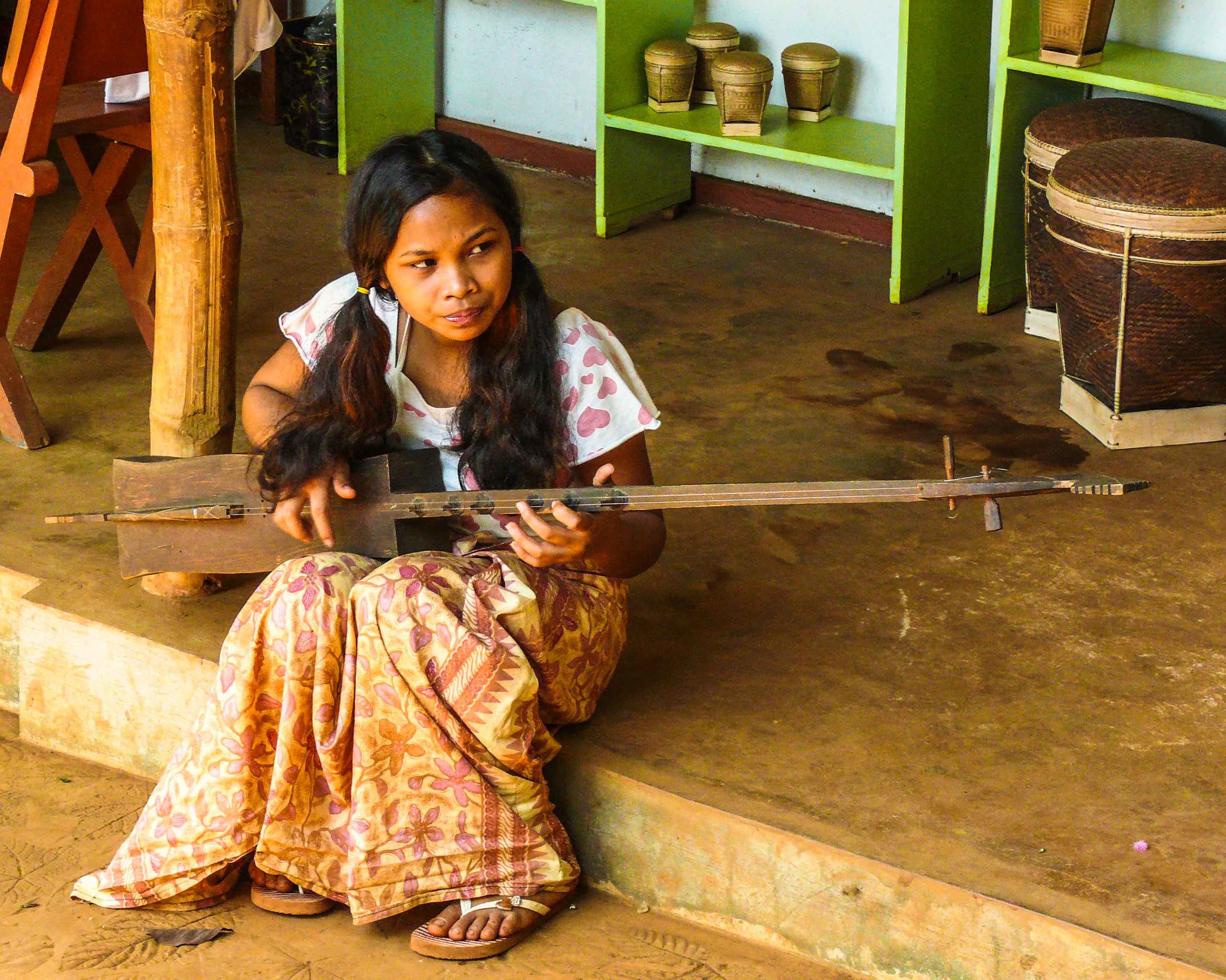 Girl with musical instrument